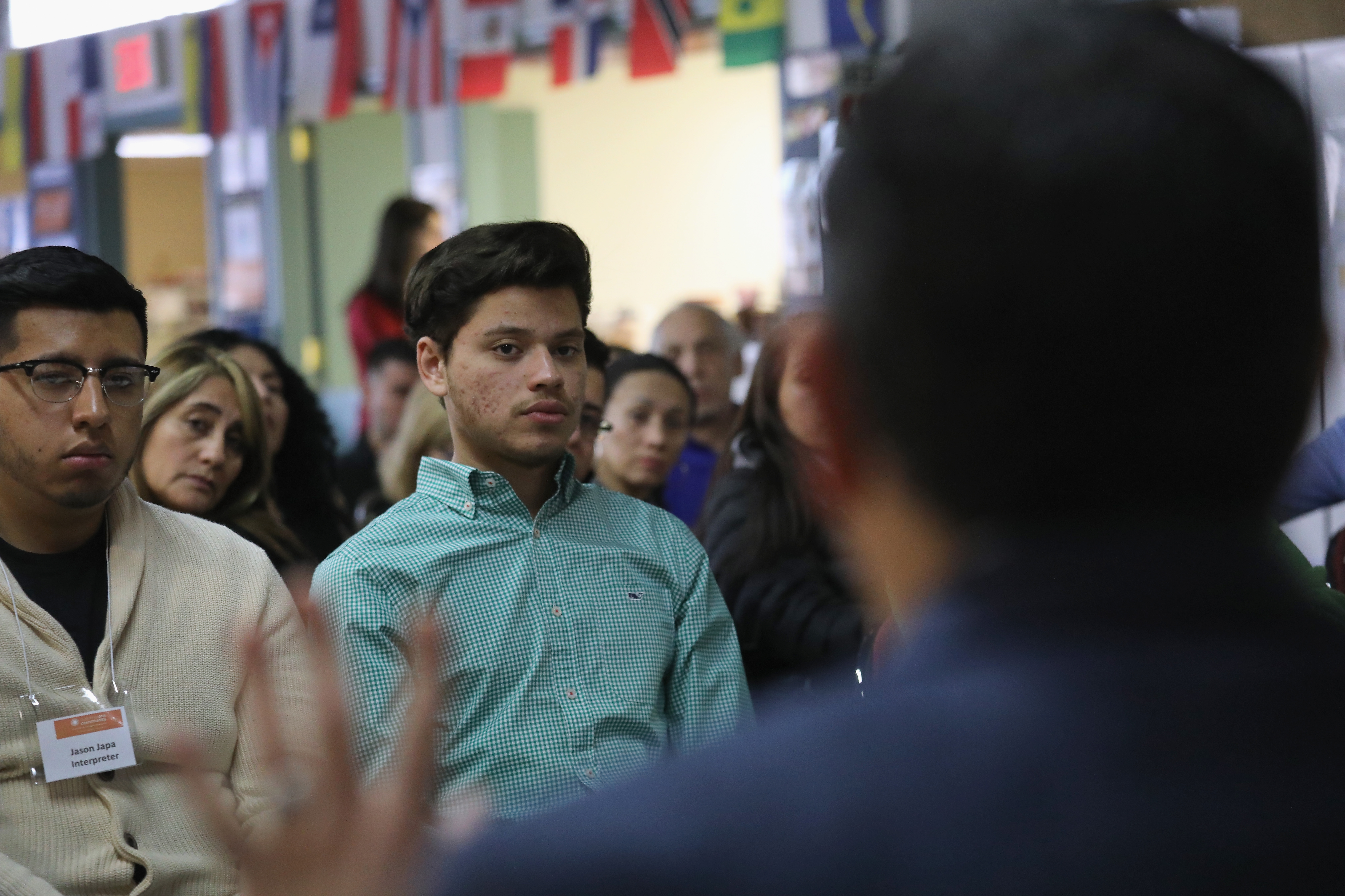 Honduran immigrant Michael Hernandez, 19, listens to an immigration attorney speak at a DACA and TPS workshop on January 27, 2018 in Stamford, Connecticut. (CREDIT: John Moore/Getty Images)