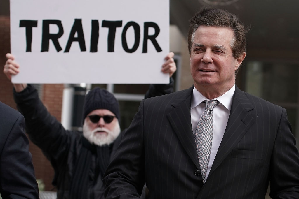 Former Trump campaign manager Paul Manafort (R) arrives at court. CREDIT: Alex Wong/Getty Images