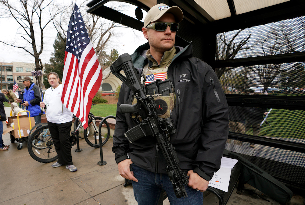 Marty Combs openly carries his AR-15 pistol at a pro gun rally on April 21, 2018 in Boulder, Colorado. (CREDIT: Rick T. Wilking/Getty Images)