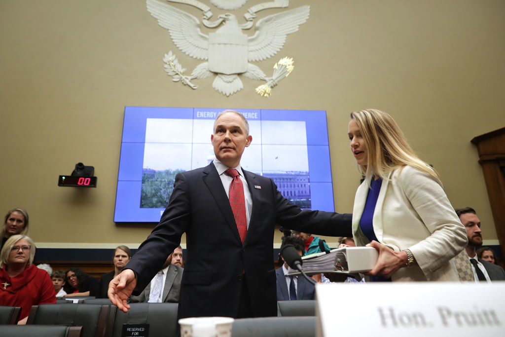 Environmental Protection Agency Administrator Scott Pruitt (C) and EPA CFO Holly Greaves (R) arrive before testifying to the House Energy and Commerce Committee's Environment Subcommittee in the Rayburn House Office Building on Capitol Hill April 26, 2018 in Washington, DC. CREDIT: Chip Somodevilla/Getty Images