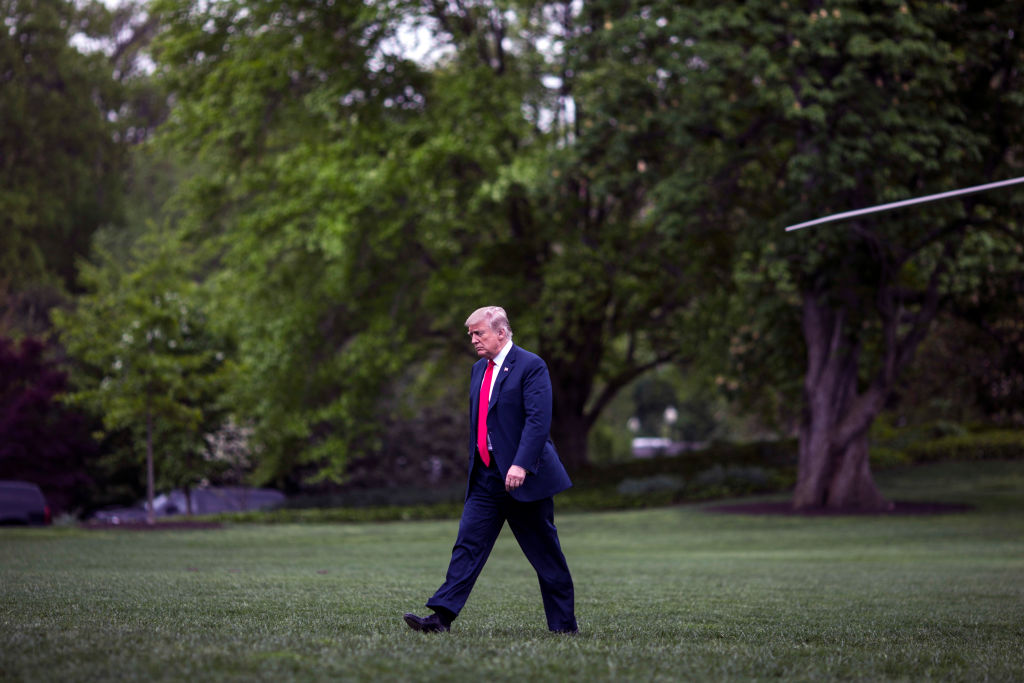WASHINGTON, DC - MAY 05: (AFP OUT) U.S. President Donald Trump crosses the South Lawn after arriving at the White House on May 5, 2018 in Washington, DC. President Trump traveled to Cleveland, Ohio to speak at Public Hall ahead of state primary elections. (CREDIT: Zach Gibson/Getty Images)