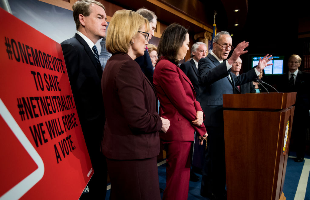 Senate Minority Leader Chuck Schumer speaks during the Senate Democrats' news conference to officially file petition to force a vote on net neutrality. CREDIT: Bill Clark/CQ Roll Call