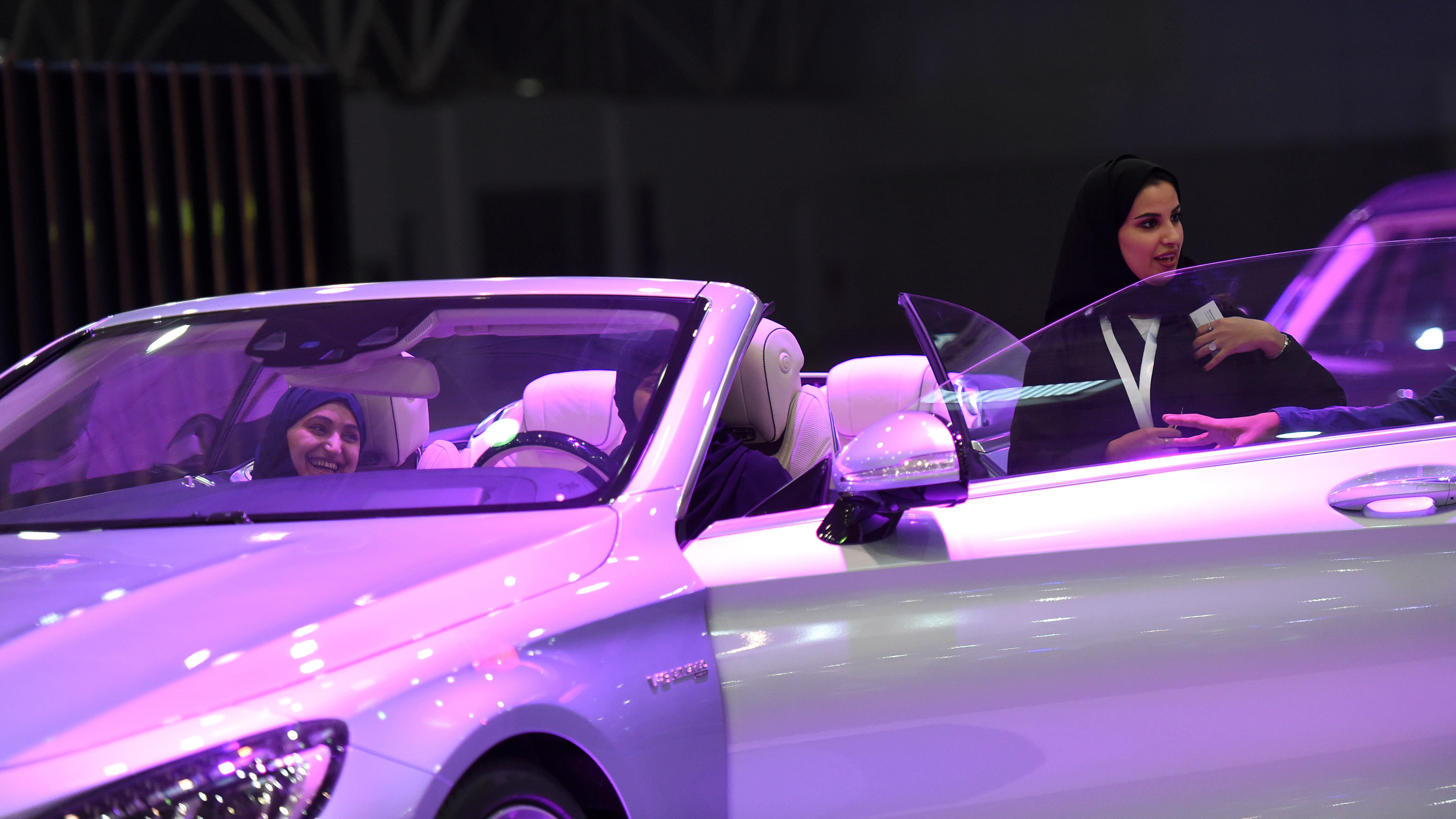 Saudi women check out cars at an automotive exhibition for women in the Saudi capital Riyadh on May 13, 2018. (CREDIT: Fayez Nureldine/AFP/Getty Images)