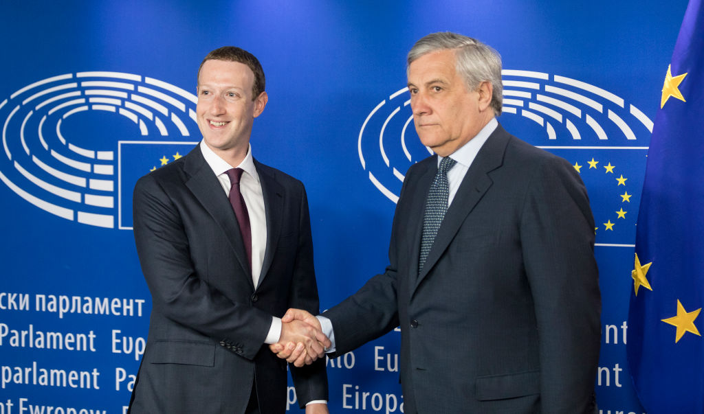 Facebook chief Mark Zuckerberg (L) is welcome by the President of the European Parliament Antonio Tajani (R) prior to their meeting on May 22, 2018 in London, England. (Photo by Thierry Monasse/Corbis via Getty Images)
