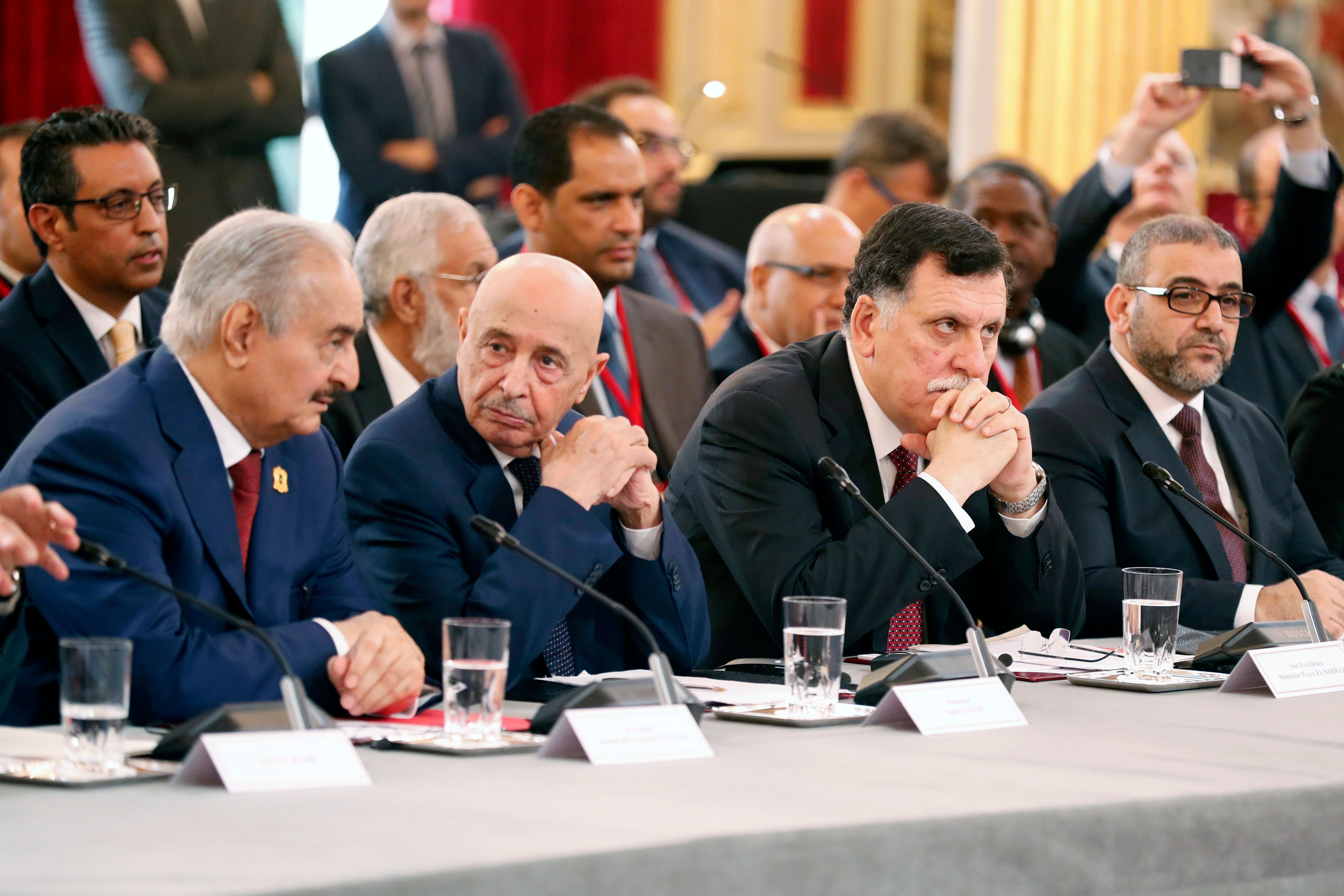 (From L) Libyan National Army's Field Marshal Khalifa Haftar, Libya's parliament speaker based in the eastern town of Tobruk Aguila Saleh Issa, Prime Minister Fayez al-Seraj, and President of the High Council of State of Libya Khaled Mechri attend an International Congress on Libya at the Elysee Palace in Paris, on May 29, 2018. (CREDIT: Etienne Laurent/AFP/Getty Images)