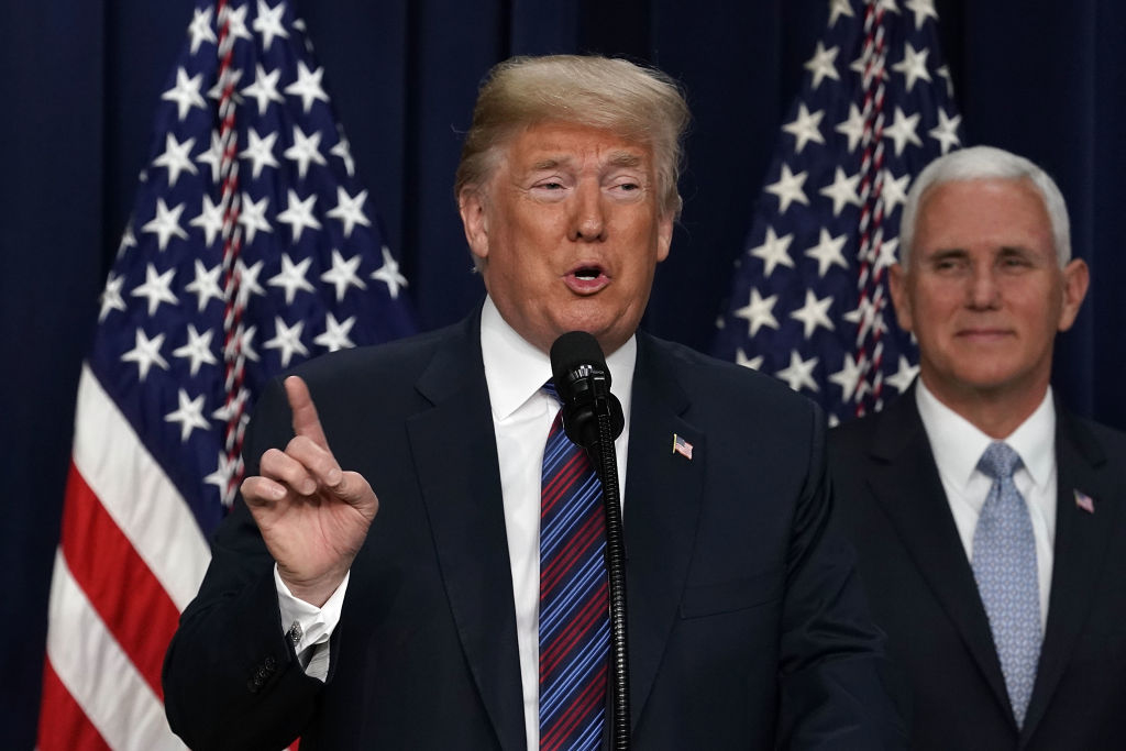 FILE PICTURE: WASHINGTON, DC - MAY 30: U.S. President Donald Trump (L) speaks as Vice President Mike Pence (R) looks on during a bill signing ceremony at the South Court Auditorium of the Eisenhower Executive Building May 30, 2018 in Washington, DC. President Trump has signed S. 204, the 'Right to Try Act' into law. (Photo by Alex Wong/Getty Images)
