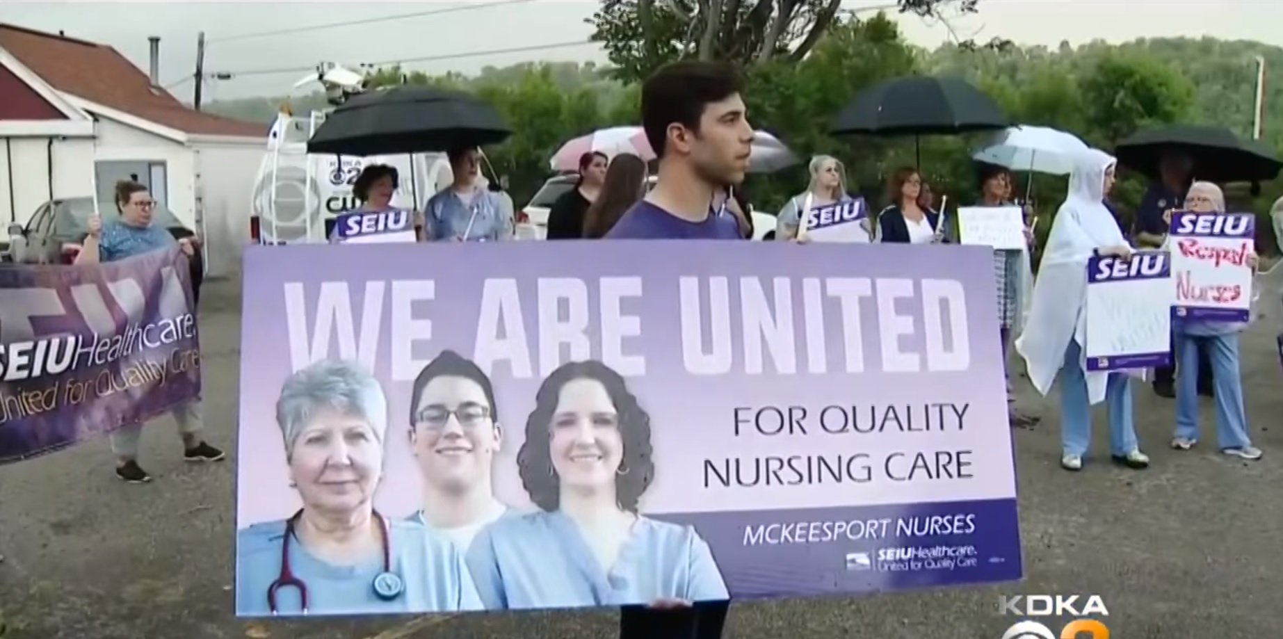 Nurses rally in front of UPMC McKeesport on Tuesday, May 22. (Credit: Screenshot, KDKA)
