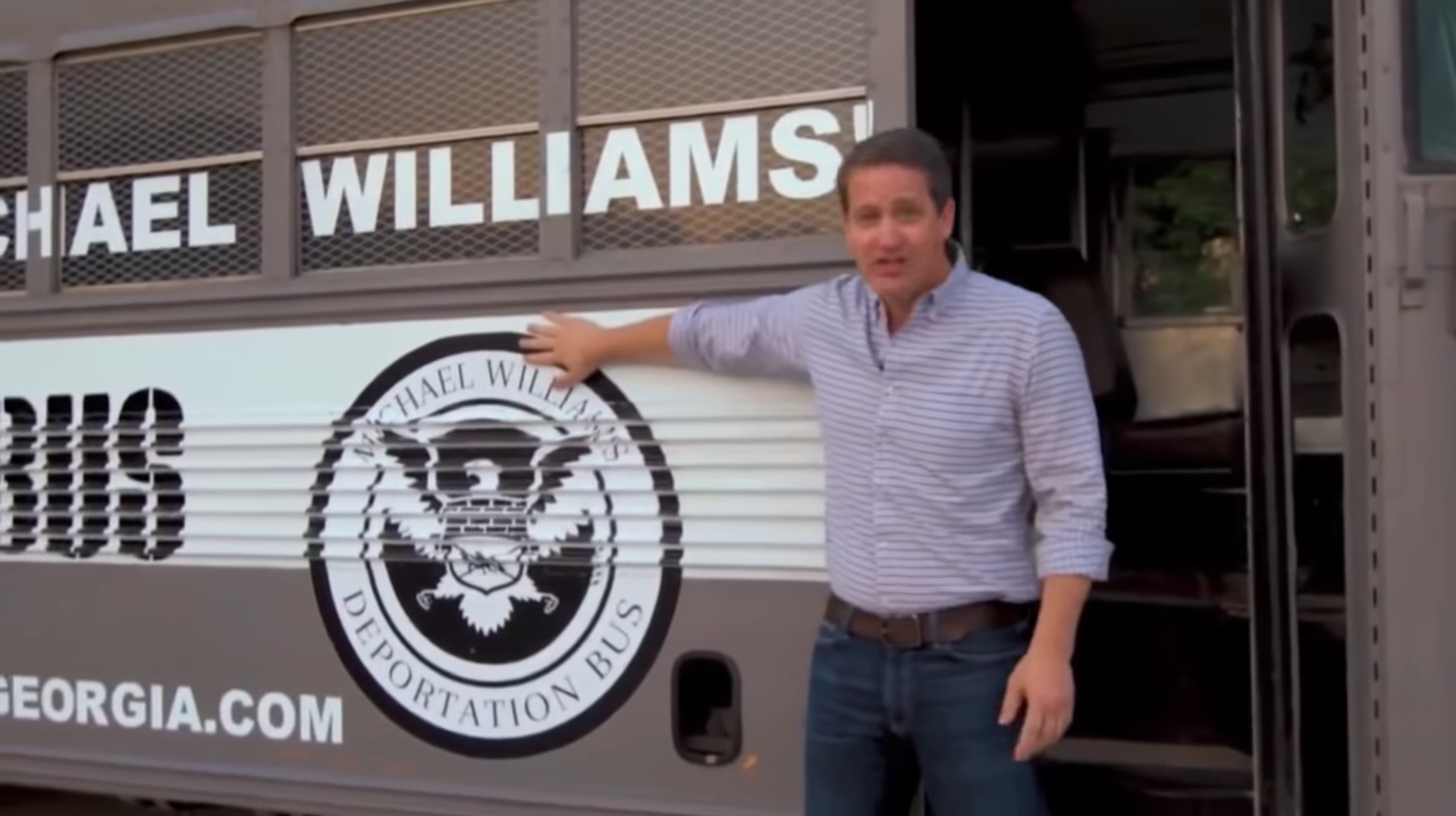 Georgia gubernatorial candidate Michael Williams (R) appears in a campaign ad with his "deportation bus." CREDIT: Michael Williams for Governor 2018/YouTube