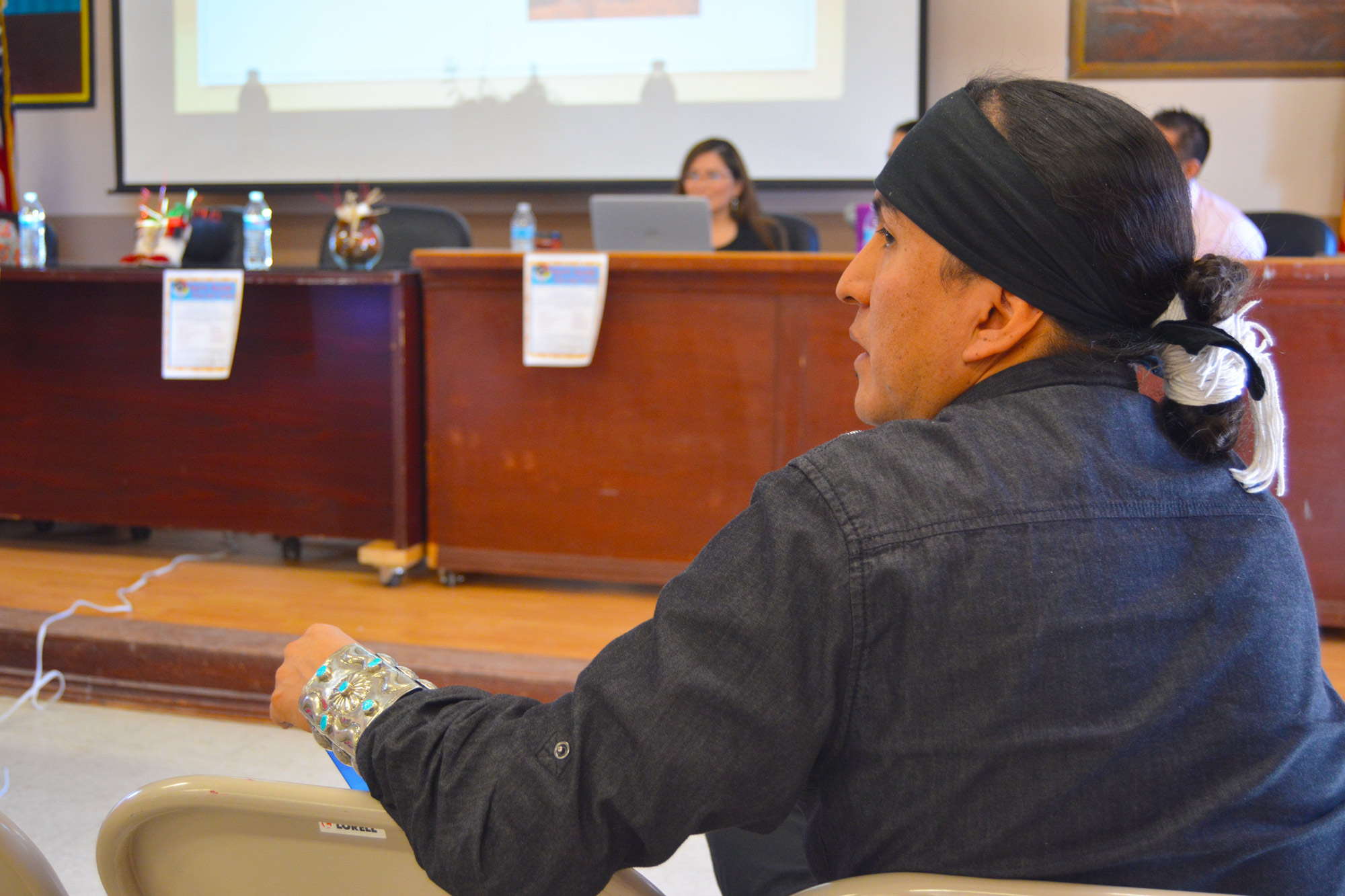 Marks listens to voters and attorneys speak during the Tuba City field hearing. CREDIT: Kira Lerner