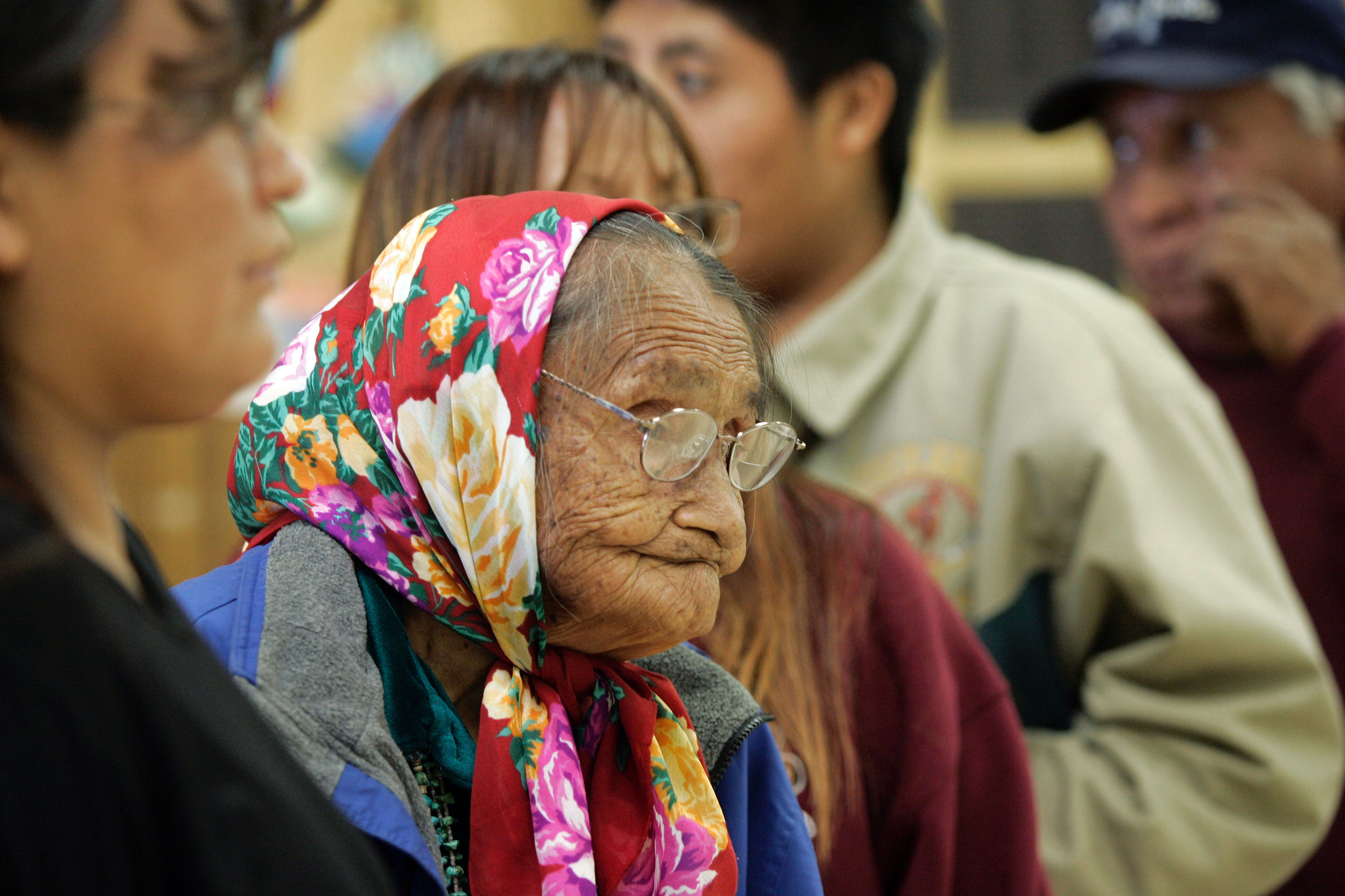 Elsie Werito, 84, a member of the To'hajiilee Chapter of the Navajo Nation, waits in line to cast her ballot at the Desiderio Center November 2, 2004 in To'hajiilee, New Mexico. Werito said she has been voting all her life and has never missed an election. (Photo by Rick Scibelli/Getty Images)