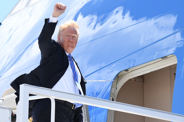 US President Donald Trump boards Air Force One has he departs Canada, where he attended the G7 summit, en route to Singapore for a meeting with North Korean leader Kim Jong Un on June 12. CREDIT: SAUL LOEB/ AFP/ Getty Images