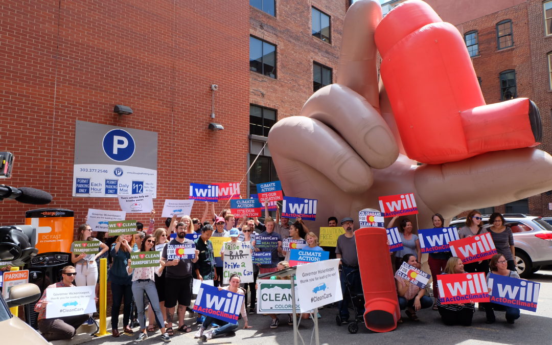 Environmental advocates hold press conference in Denver on June 19, 2018 on Colorado Gov. John Hickenlooper's decision to sign an executive order directing the state to adopt advanced clean car standards. CREDIT: Conservation Colorado