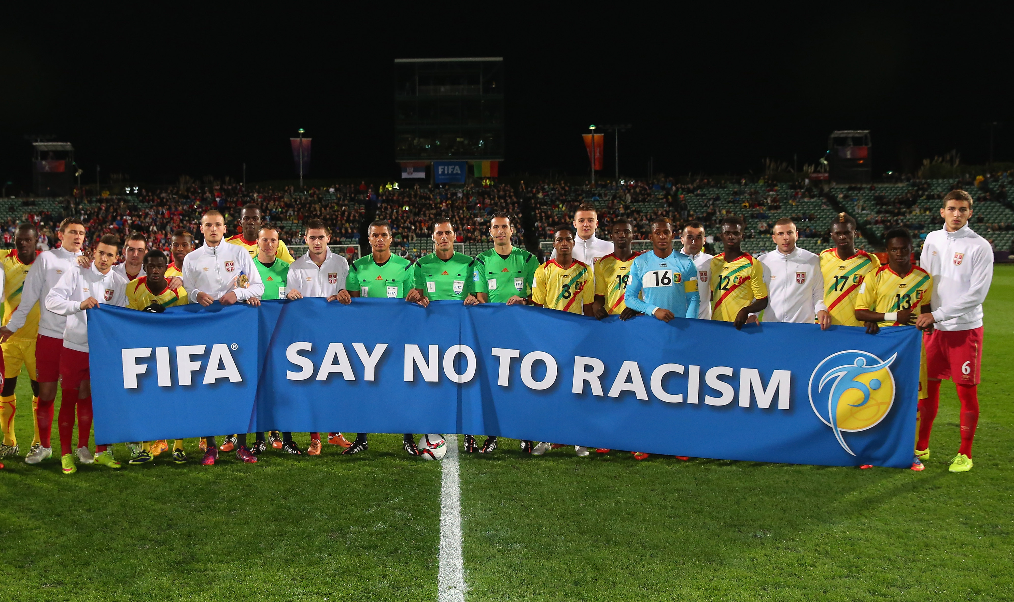 AUCKLAND, NEW ZEALAND - JUNE 17: The players of Serbia and Mali display a Say No To Racism banner prior to the FIFA U-20 World Cup Semi Final match between Serbia and Mali at North Harbour Stadium on June 17, 2015 in Auckland, New Zealand. (Photo by Alex Livesey - FIFA/FIFA via Getty Images)