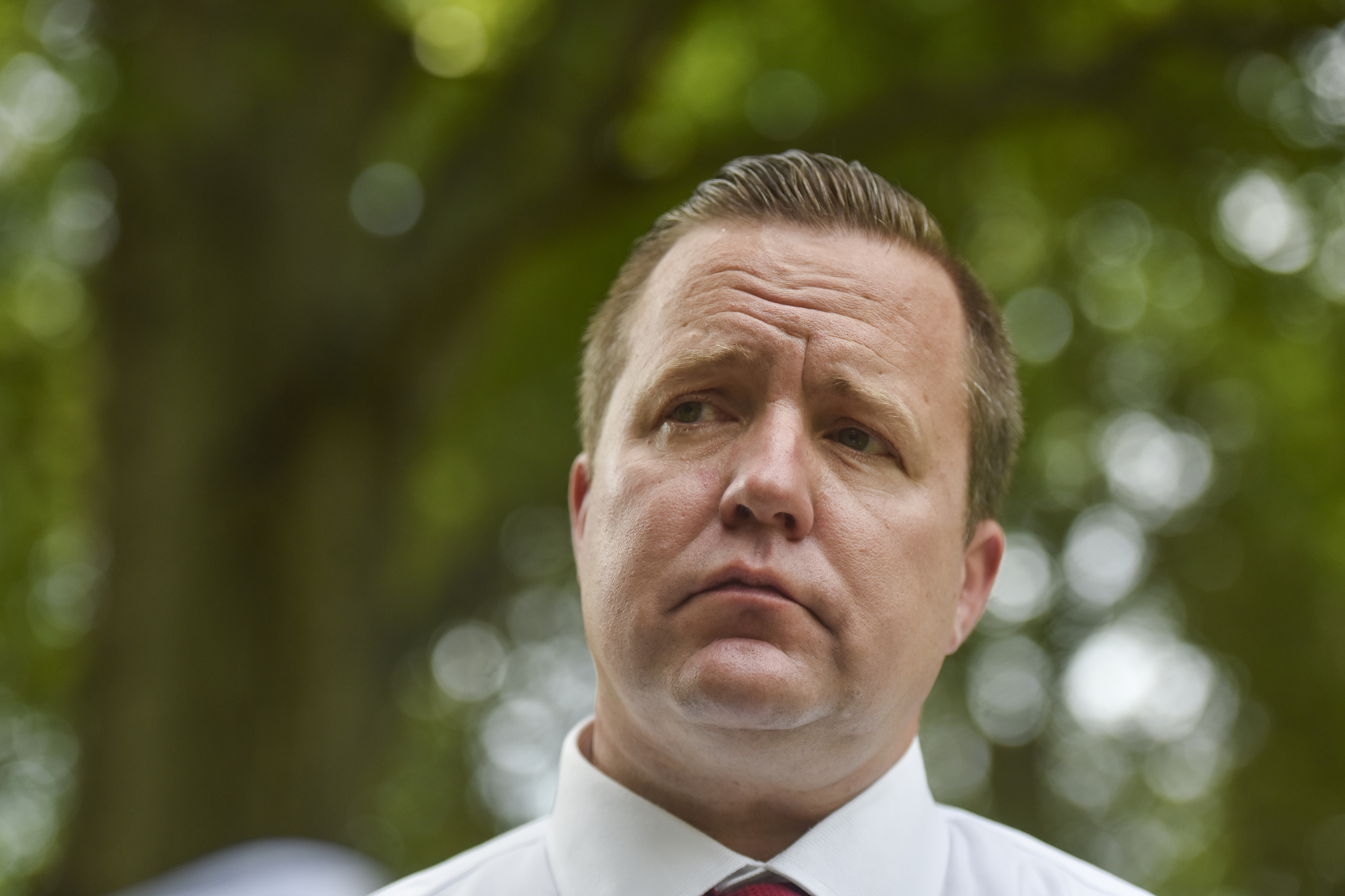 Corey Stewart talks with the media after his announcement to challenge Senator Tim Kaine (D-Va.) in 2018, at his home on Thursday, July 13, 2017, in Woodbridge, VA. CREDIT: Jahi Chikwendiu/The Washington Post via Getty Images