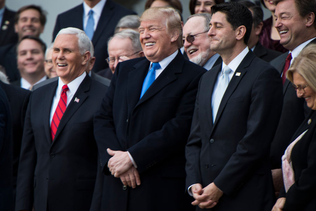 President Donald Trump with Vice President Mike Pence, and House Speaker Paul Ryan of Wisconsin on December 20, 2017. (CREDIT: Photo by Jabin Botsford/The Washington Post via Getty Images)