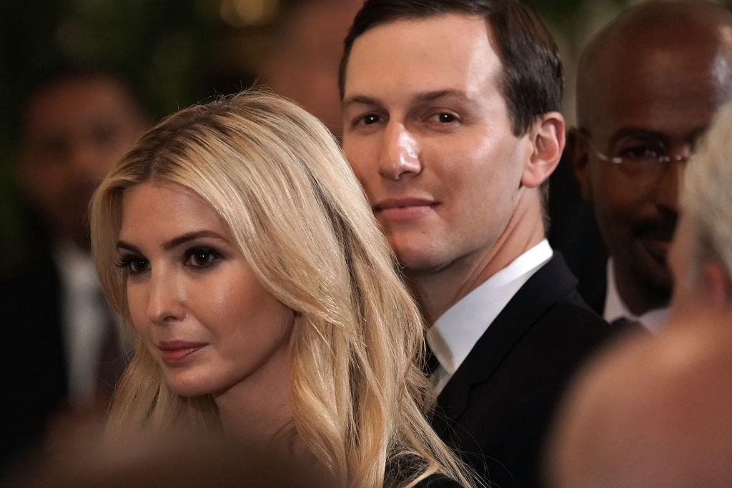 Senior adviser and daughter Ivanka Trump (L), and senior adviser and son-in-law Jared Kushner (R) attend a summit at the East Room of the White House May 18, 2018 in Washington, DC. The White House hosted a summit to discuss prison reform. (Photo by Alex Wong/Getty Images)
