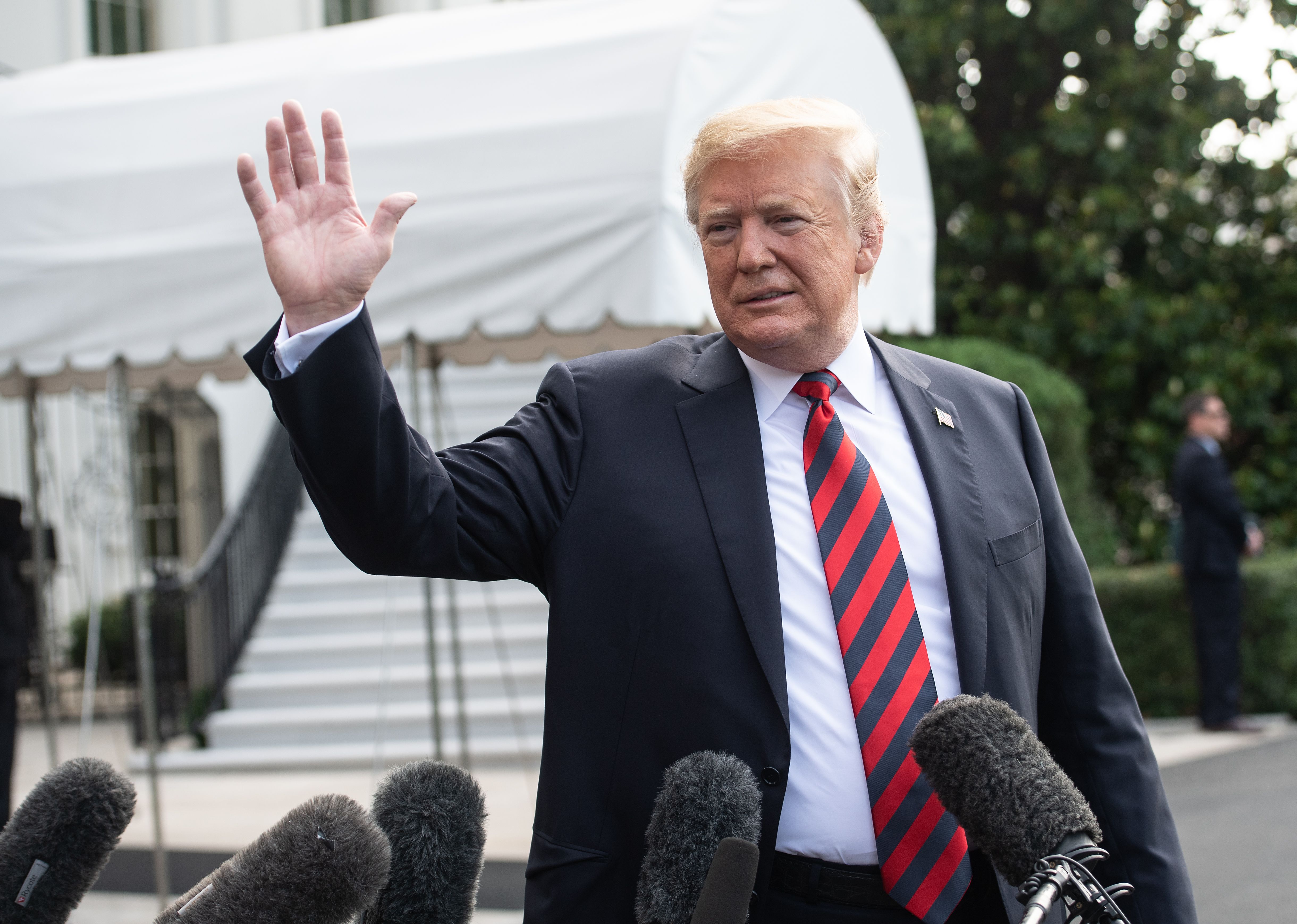 US President Donald Trump speaks to the press before departing the White House for the G7 summit in Washington, DC, on June 8, 2018. (CREDIT: NICHOLAS KAMM/AFP/Getty Images)