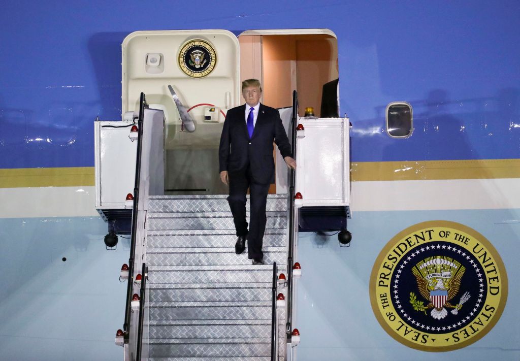 Donald Trump steps off of Air Force One at Paya Lebar Air Base on June 10, 2018 in Singapore. (CREDIT: Zhen/China News Service/VCG via Getty Images)