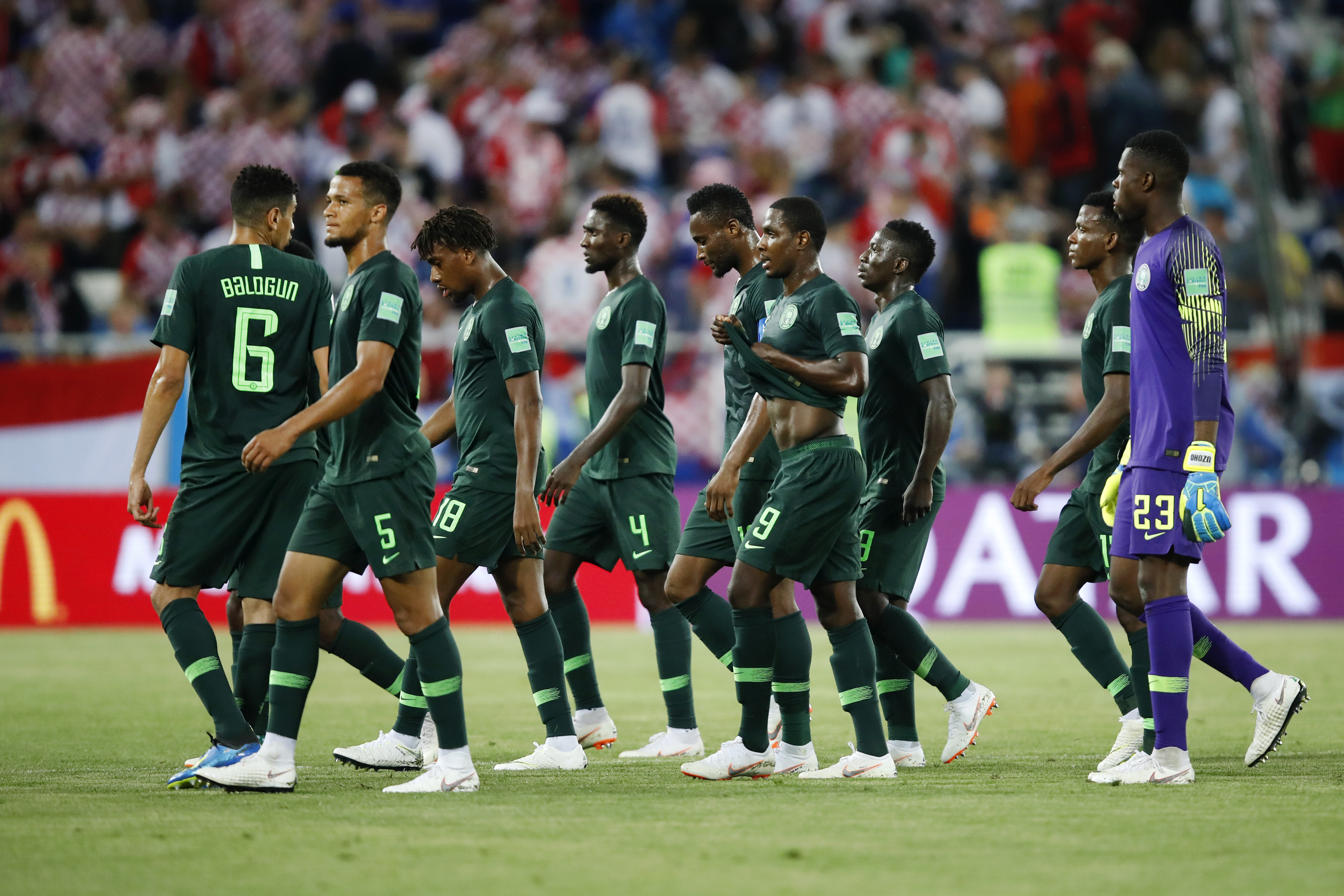 Members of Nigeria's World Cup team leave the pitch at halftime during their June 16 match against Croatia in Kaliningrad, Russia. Croatia won 2-0. CREDIT: Julian Finney/Getty Images