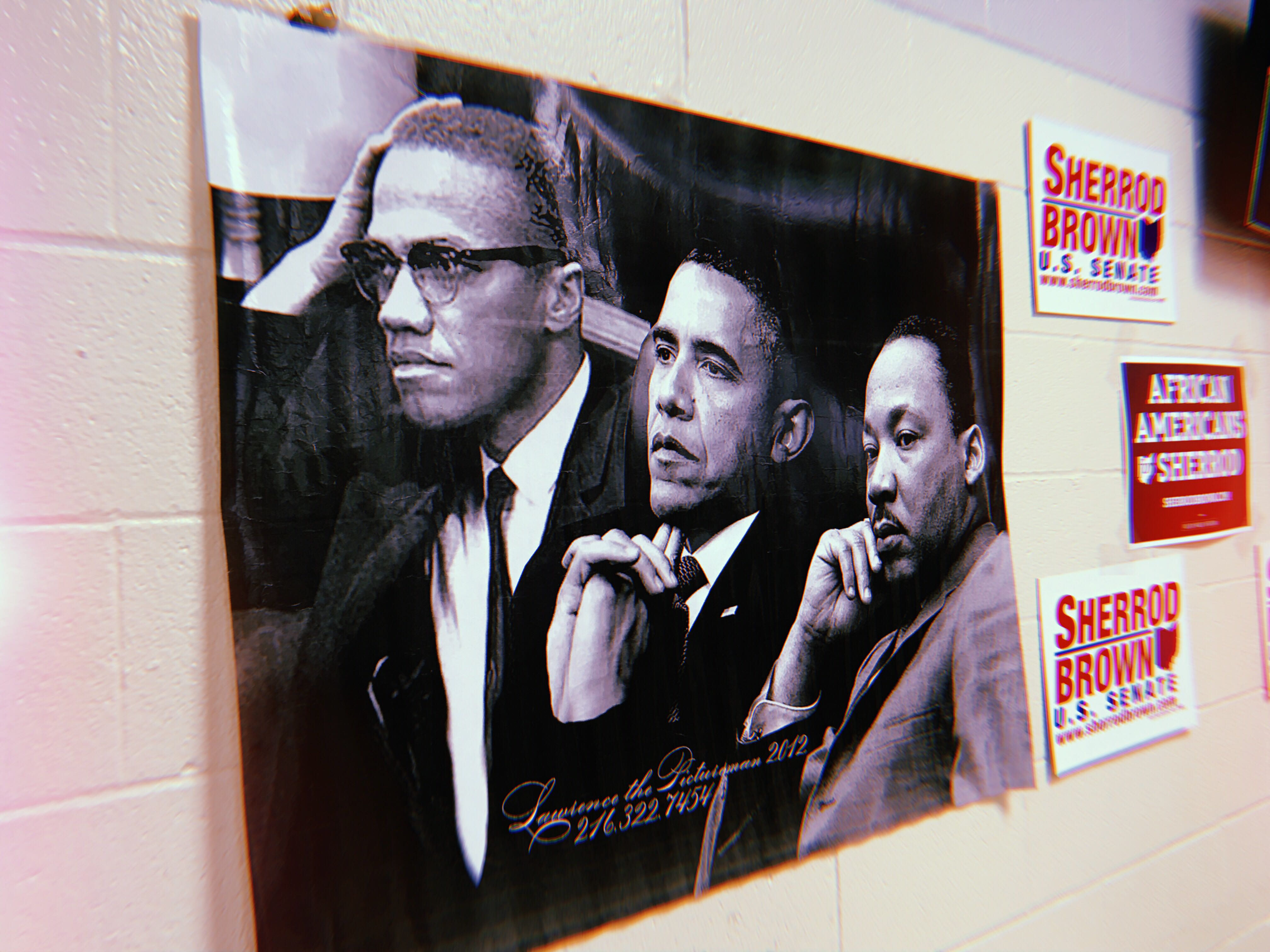 A poster hanging on the wall at Monday's event. CREDIT: Addy Baird