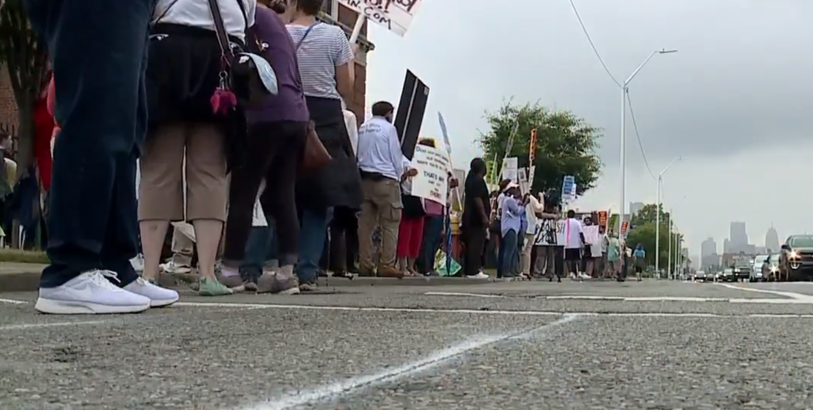 Activists protest outside ICE agency in downtown Detroit. Credit: Screenshot, WXYZ