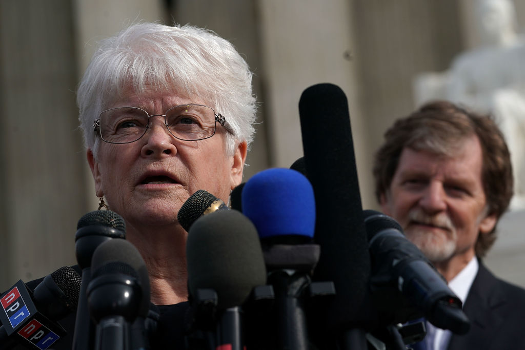 WASHINGTON, DC - DECEMBER 05: Barronelle Stutzman speaking as Jack Phillips watches. CREDIT: Alex Wong/Getty Images