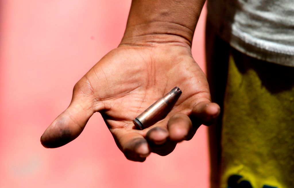 A demonstrator shows what appears to be a shell casing, found after an attack during clashes with riot police in Masaya, Nicaragua on June 2, 2018. (CREDIT: INTI OCON/AFP/Getty Images)