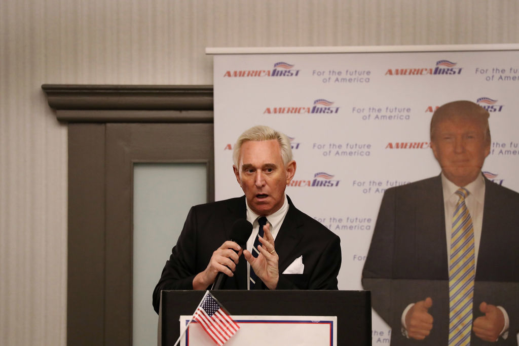 Former Trump adviser Roger Stone aigns copies of his book on the President, March 21, 2017 in Boca Raton, Florida. CREDIT: Joe Raedle/Getty Images.