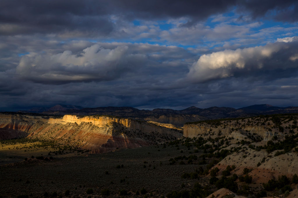 The setting sun sets sandstone cliffs ablaze with light along Cottonwood Road near the Kodachrome Basin in the Grand Staircase-Escalante National Monument, Utah, on Sept. 28, 2017. (Credit: Brian van der Brug/Los Angeles Times via Getty Images)