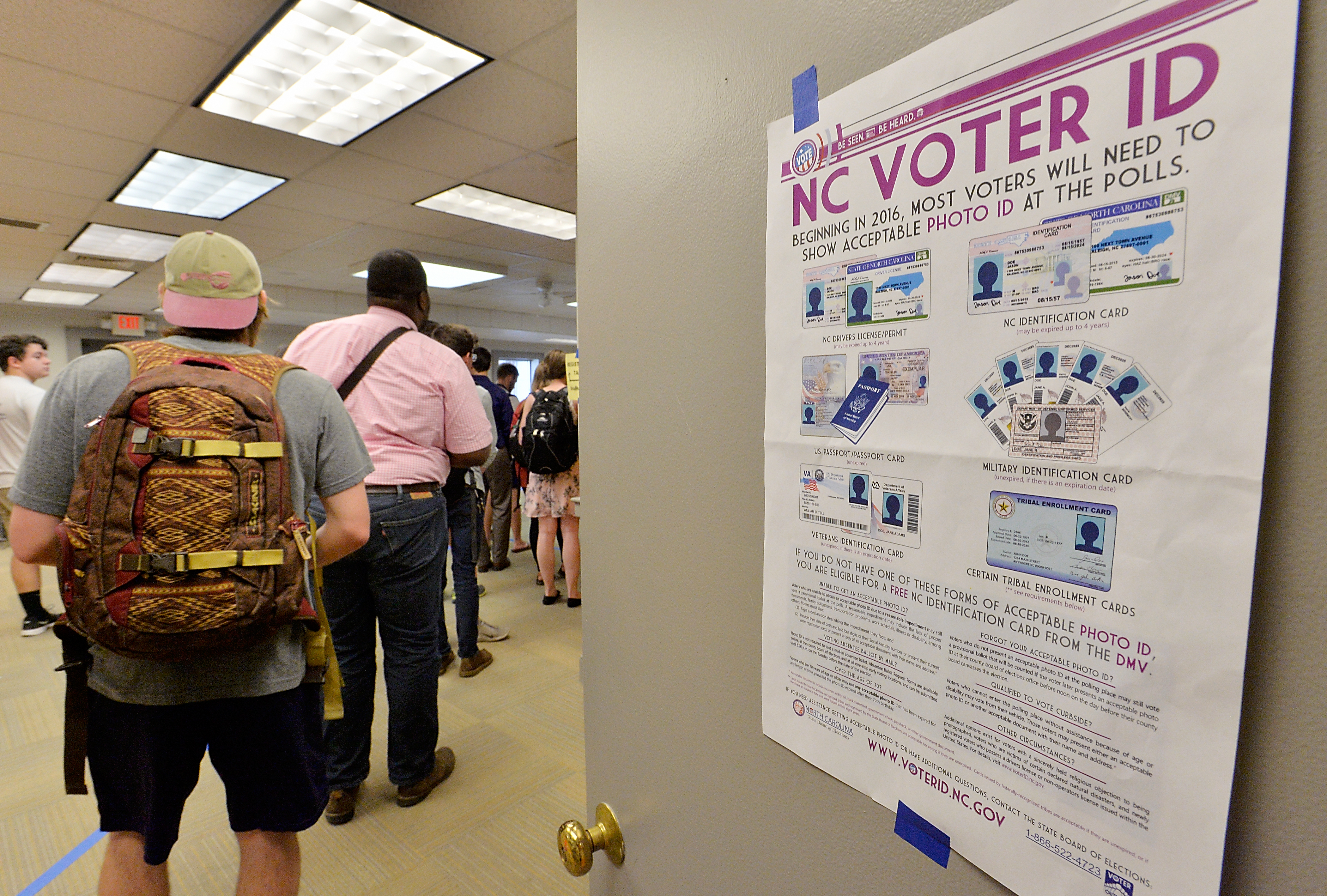 North Carolina State University students wait in line to vote in the primaries at Pullen Community Center on March 15, 2016 in Raleigh, North Carolina. The North Carolina primaries is the state's first use of the voter ID law, which excludes student ID cards. (Photo by Sara D. Davis/Getty Images )