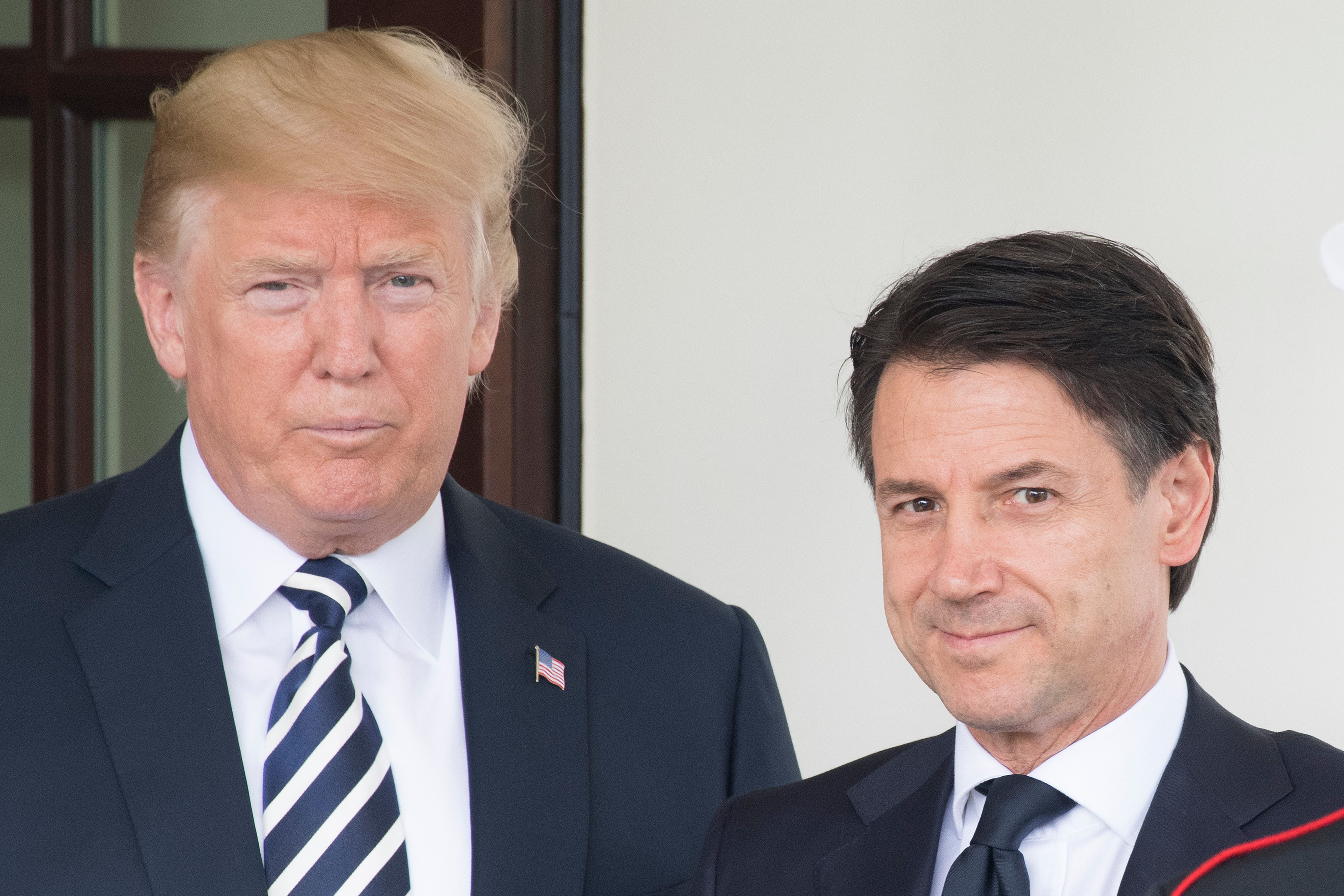 President Donald Trump stands with Italian Prime Minister Giuseppe Conte at the White House in Washington, DC, July 30, 2018. CREDIT: Jim Watson/AFP/Getty Images.