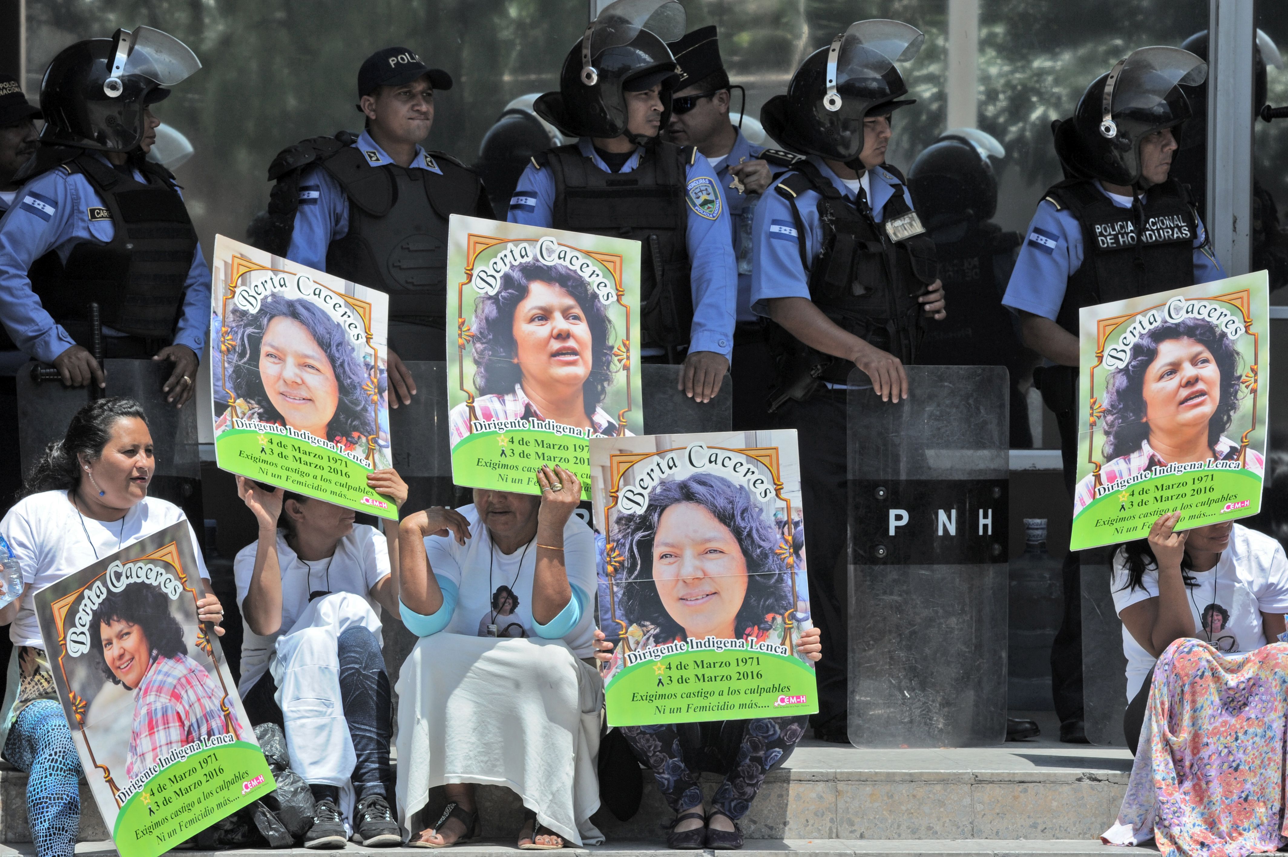 FILE PICTURE: Human rights activists take part in a protest to claim justice after the murdered of indigenous activist leader Berta Caceres in Tegucigalpa on March 17, 2016. AFP PHOTO/Orlando SIERRA. / AFP / ORLANDO SIERRA (Photo credit should read ORLANDO SIERRA/AFP/Getty Images)