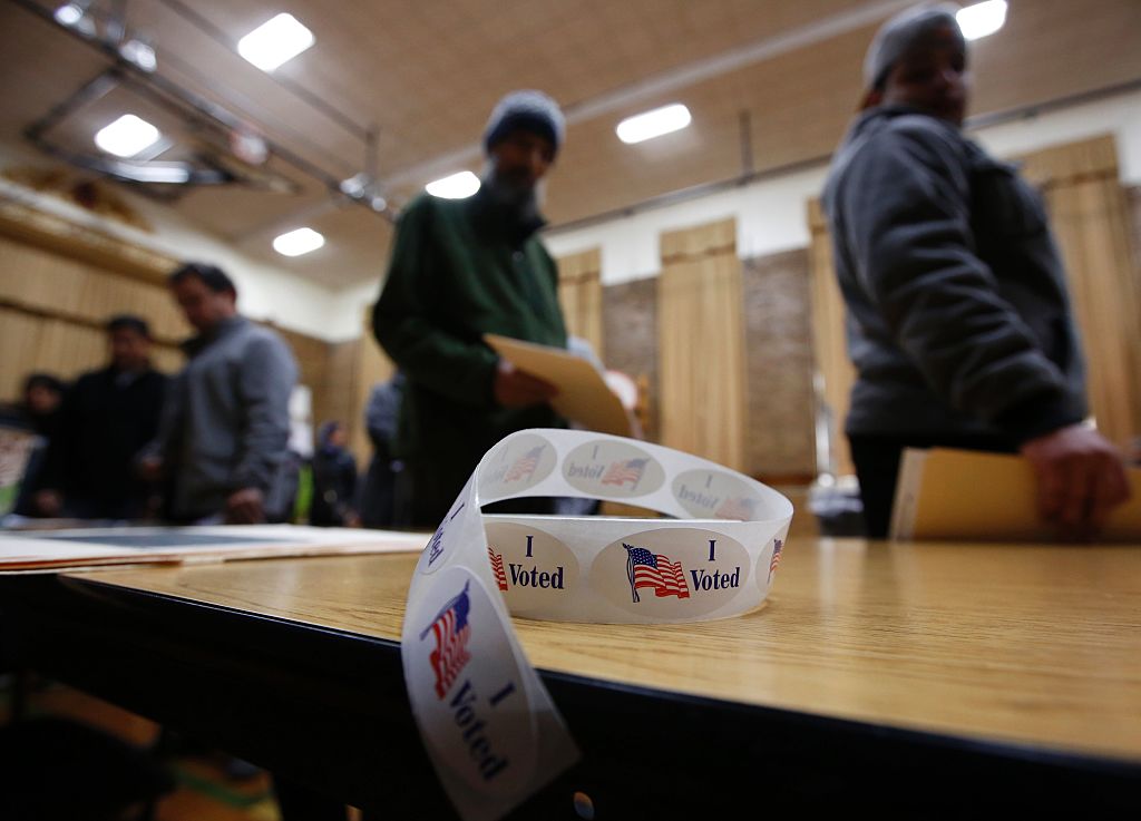 A roll of I Voted stickers sits on a table at Oakman Elementary School during the US presidential election on November 8, 2016 in Dearborn, Michigan. / AFP / JEFF KOWALSKY (Photo credit should read JEFF KOWALSKY/AFP/Getty Images)