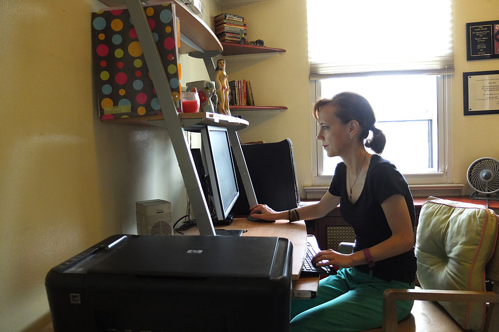 Sunday routine of Megan Abbott, an American author of crime fiction, in Forest Hills, Queen on Sunday, August 21, 2016. This image: Megan Abbott writing in her home office on Burns Street. CREDIT: Hiroyuki Ito/Getty Images