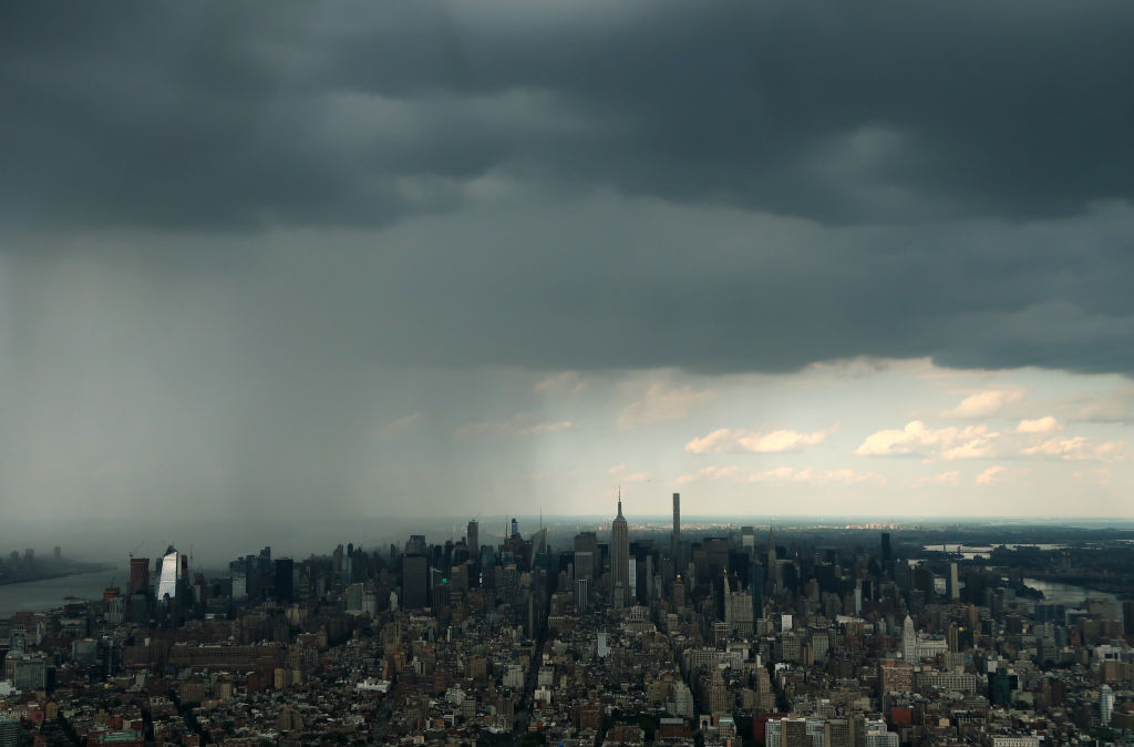 A rain storm moves across Manhattan behind the Empire State Building in New York City on July 3 2017. (Credit: Gary Hershorn/Getty Images)