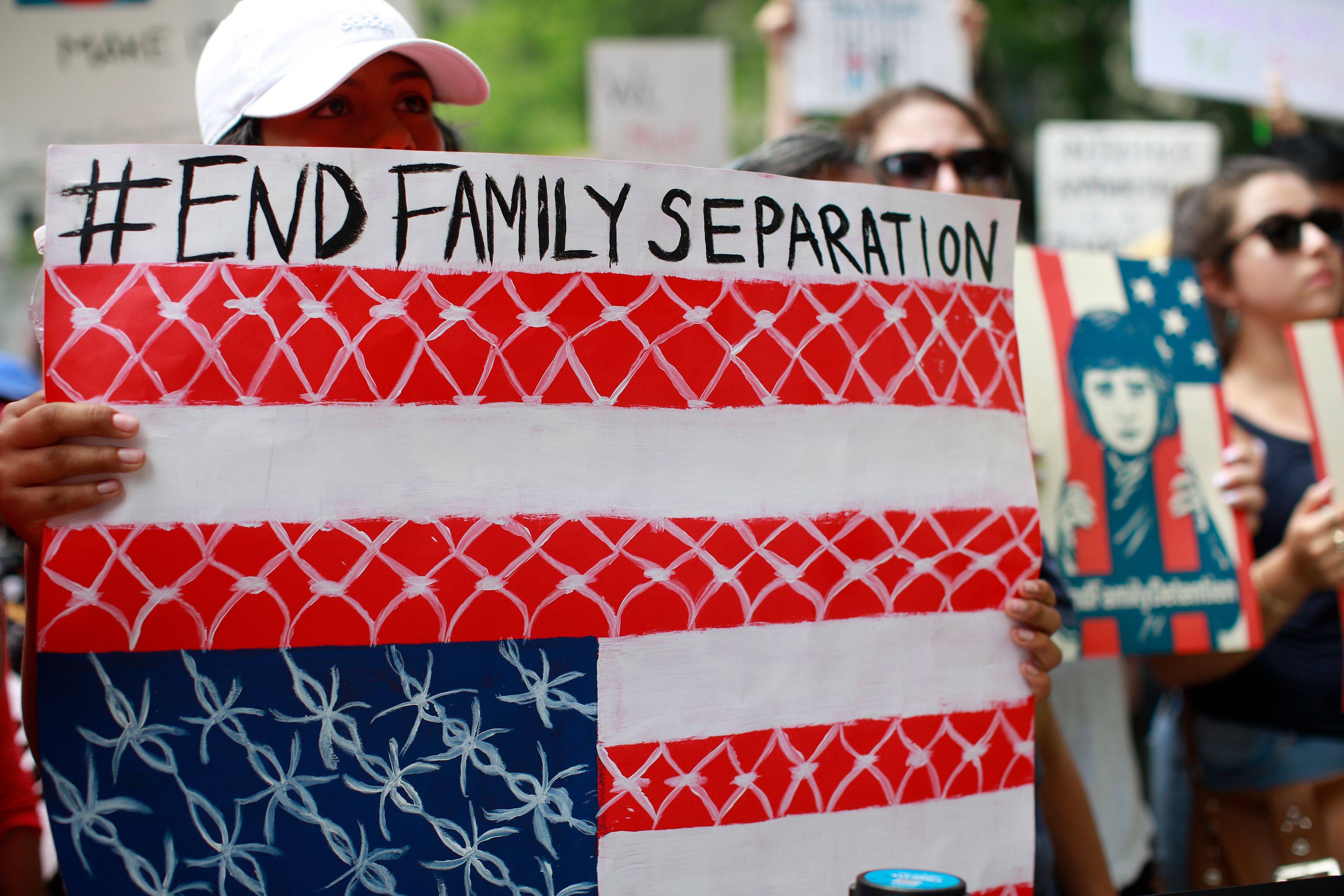 Protestors gather for a demonstration against the US immigration policies separating migrant families in Chicago, June 30, 2018. - Demonstrations are being held across the US on Saturday, June 30, 2018 against President Donald Trump's hardline immigration policy. (Photo by JIM YOUNG / AFP) (Photo credit should read JIM YOUNG/AFP/Getty Images)