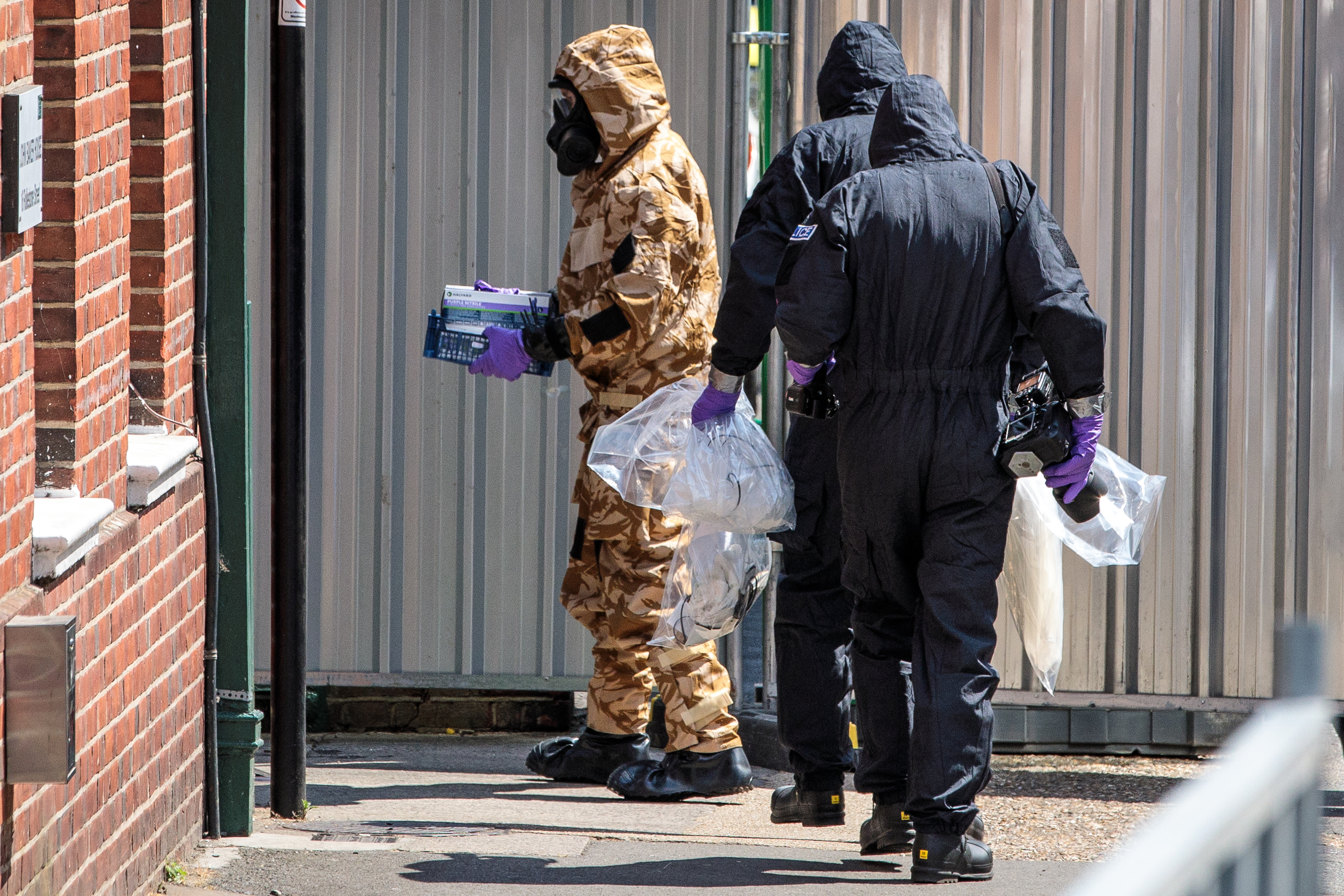 SALISBURY, ENGLAND - JULY 06: Emergency workers in protective suits search around John Baker House Sanctuary Supported Living after a major incident was declared when a man and woman were exposed to the Novichok nerve agent on July 6, 2018 in Salisbury, England. (Photo by Jack Taylor/Getty Images)