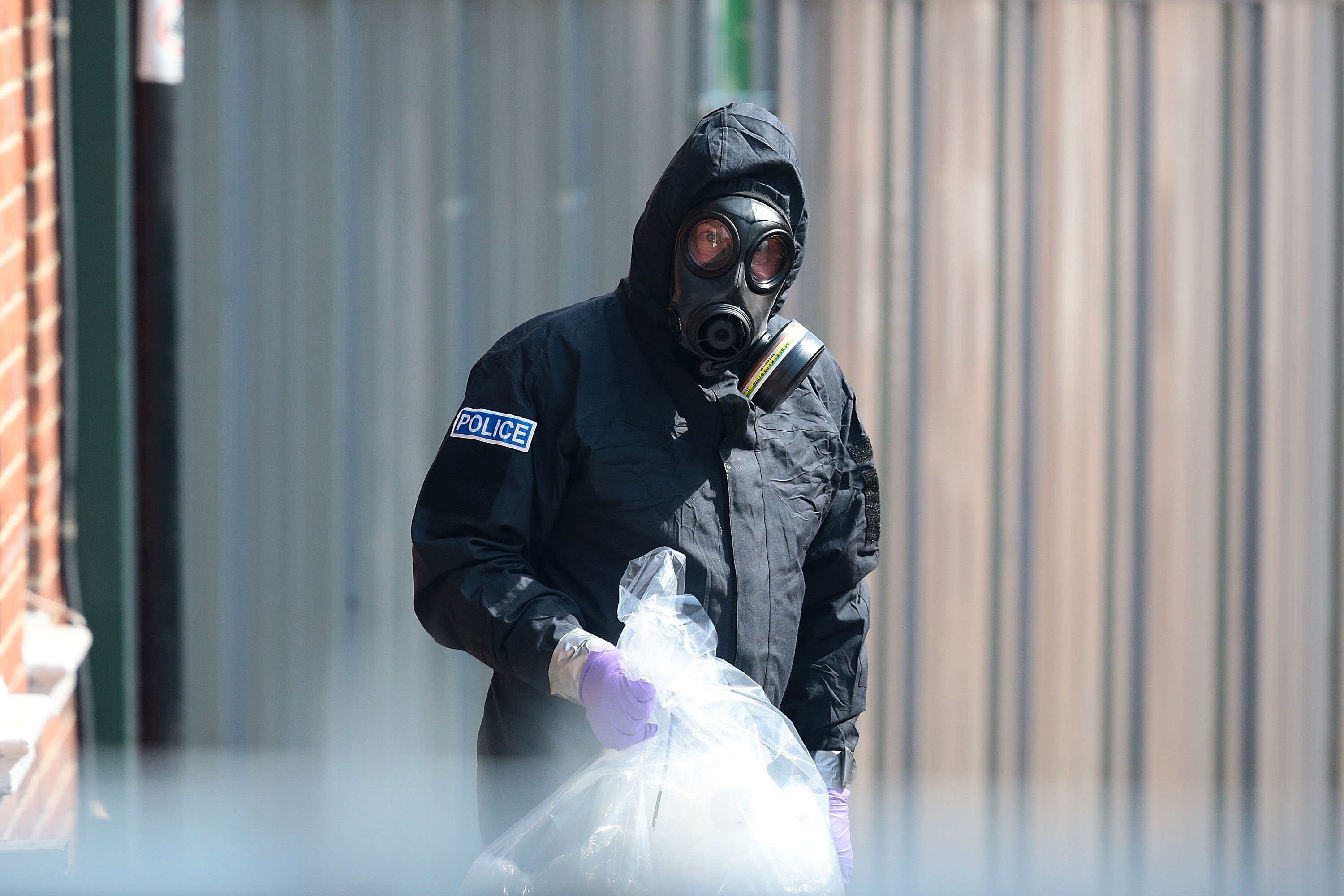 Emergency workers search the area where a man and woman were exposed to the Novichok nerve agent on July 6, 2018 in Salisbury, England. (CREDIT: Jack Taylor/Getty Images)