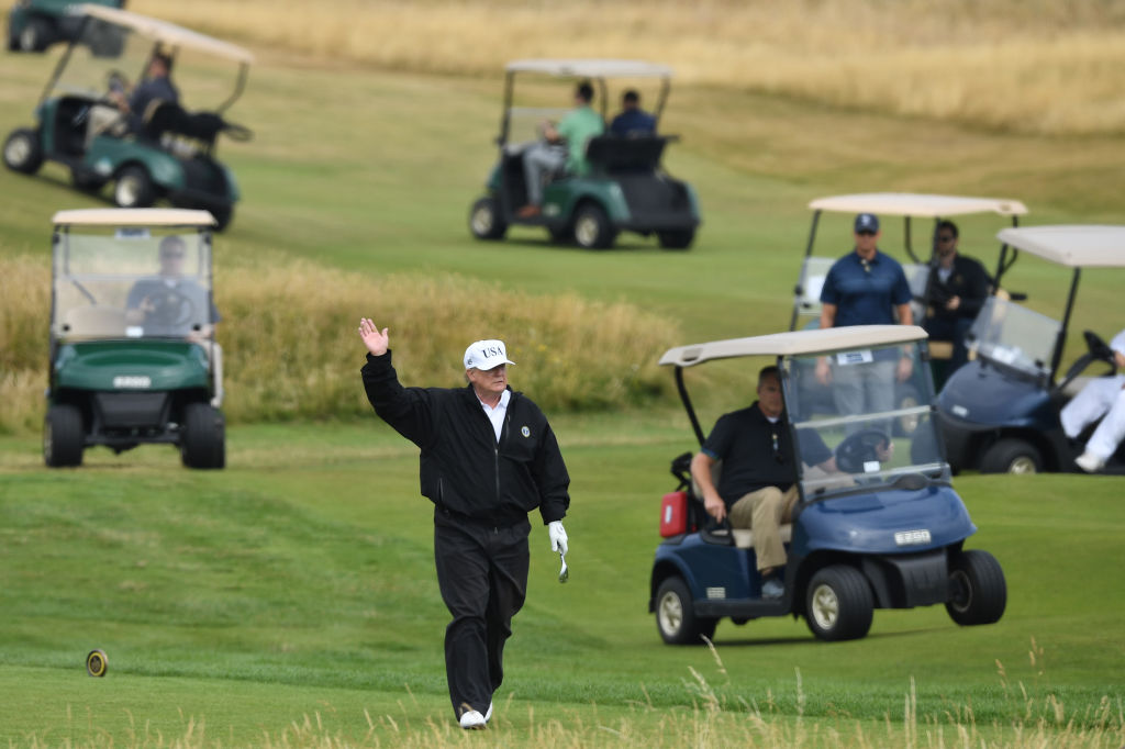 TRUMP GOLFS ON SATURDAY AT HIS PRIVATE CLUB IN SCOTLAND. (CREDIT: Leon Neal/Getty Images)