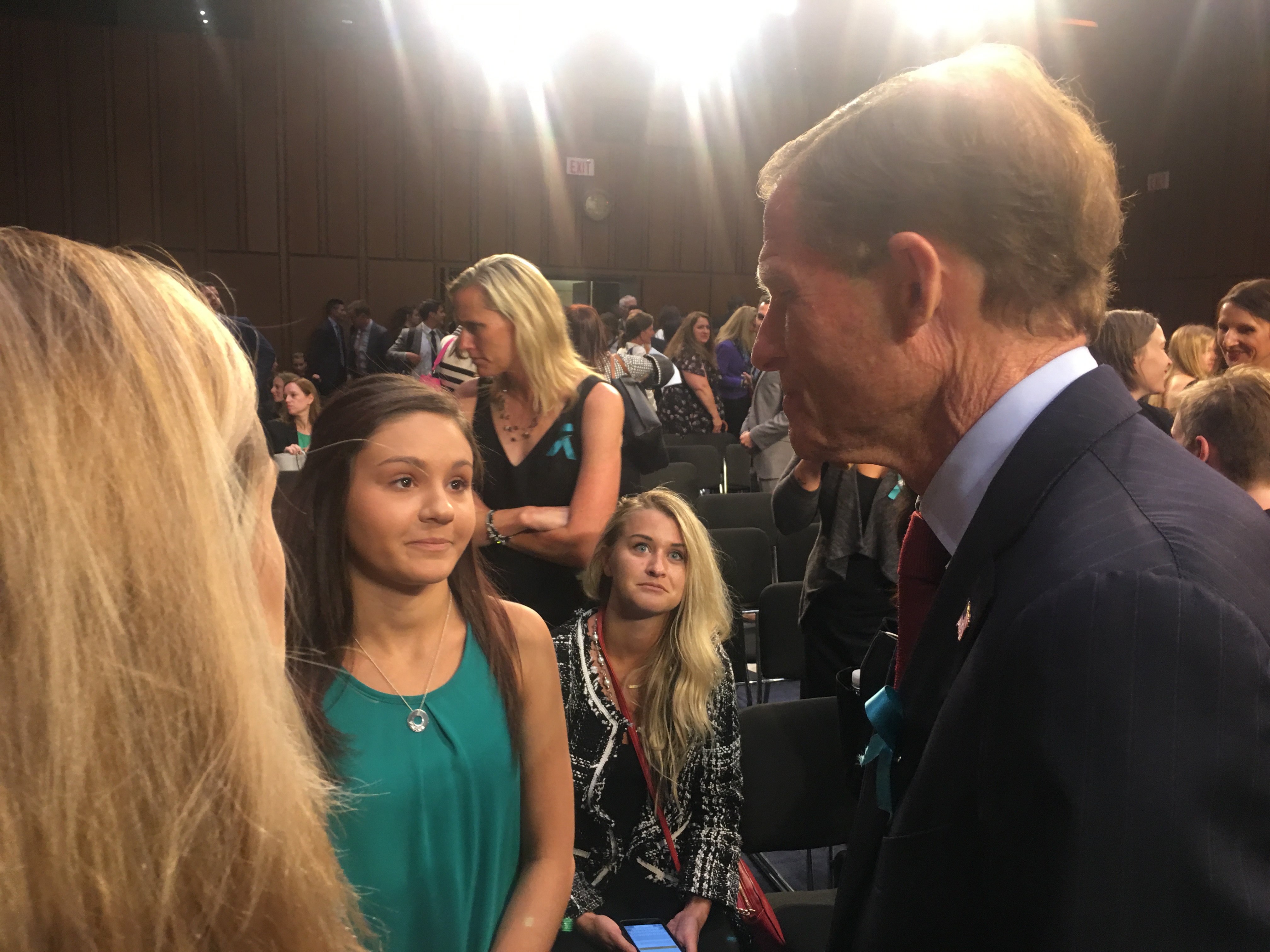 Sen. Blumenthal speaks with Nassar survivor Kaylee Lorincz after the hearing. "You made me cry," she told him after she thanked him for the support. CREDIT: Lindsay Gibbs