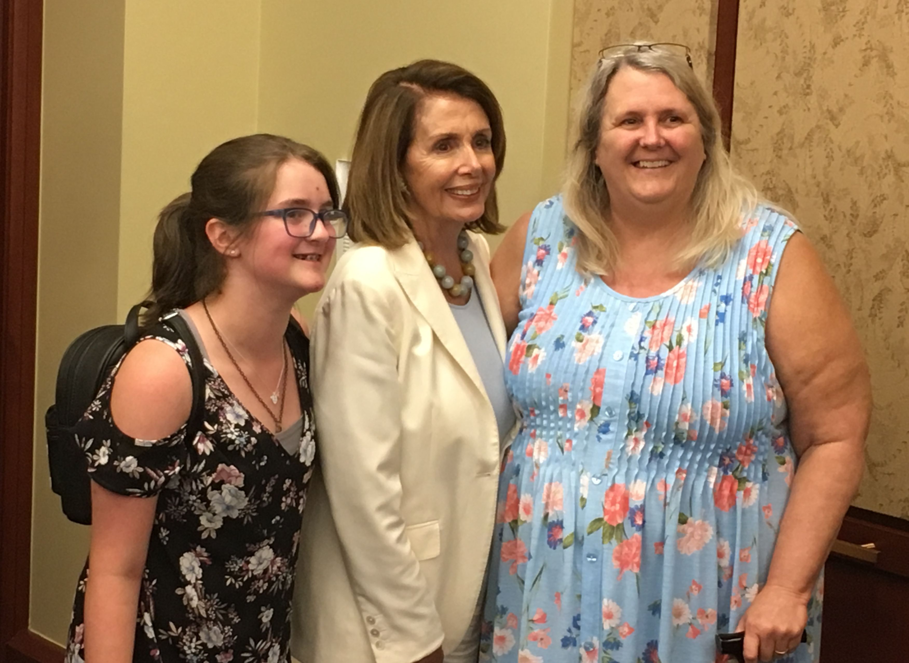 Peggy Price (right), a former Marine who was stationed at Camp Lejeune in North Carolina, testified on July 11, 2018, before House Democrats, including House Minority Leader Nancy Pelosi. Price's granddaughter is on the left. CREDIT: Mark Hand/ThinkProgress