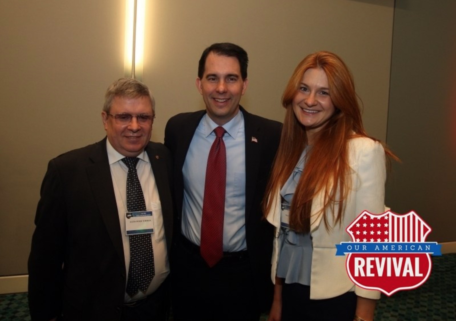 Mariia Butina (right) has close ties with many conservative lawmakers and organizations, including the National Rifle Association and Gov. Scott Walker (R-WI), seen in the middle. Credit: VK.com/Mariia Butina