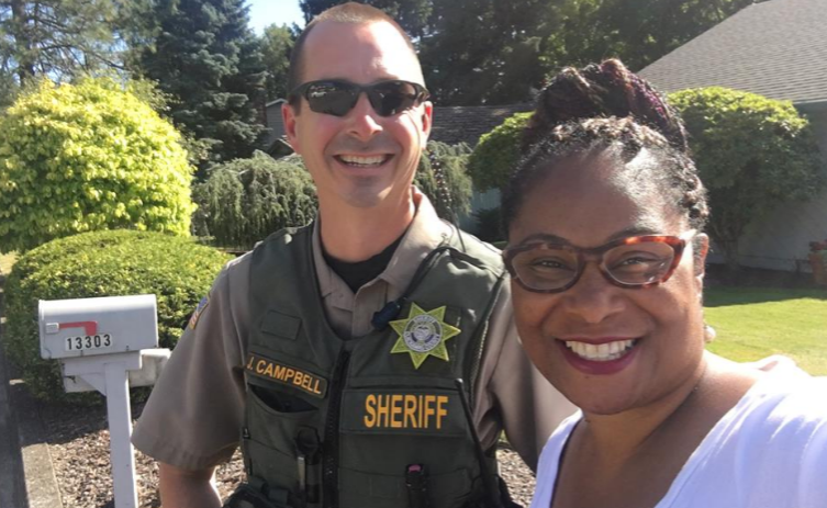 Oregon State Representative Janelle Bynum took a photo with the police officer called. (Credit: Facebook)