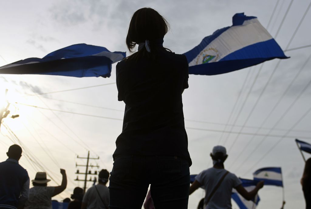 Anti-government activists hold a demonstration in Managua, Nicaragua, on July 3, 2018, demanding justice for those killed in recent protests, and the immediate resignation of Nicaraguan President Daniel Ortega and his wife and Vice President Rosario Murillo. (PHOTO CREDIT: MARVIN RECINOS/AFP/Getty Images)