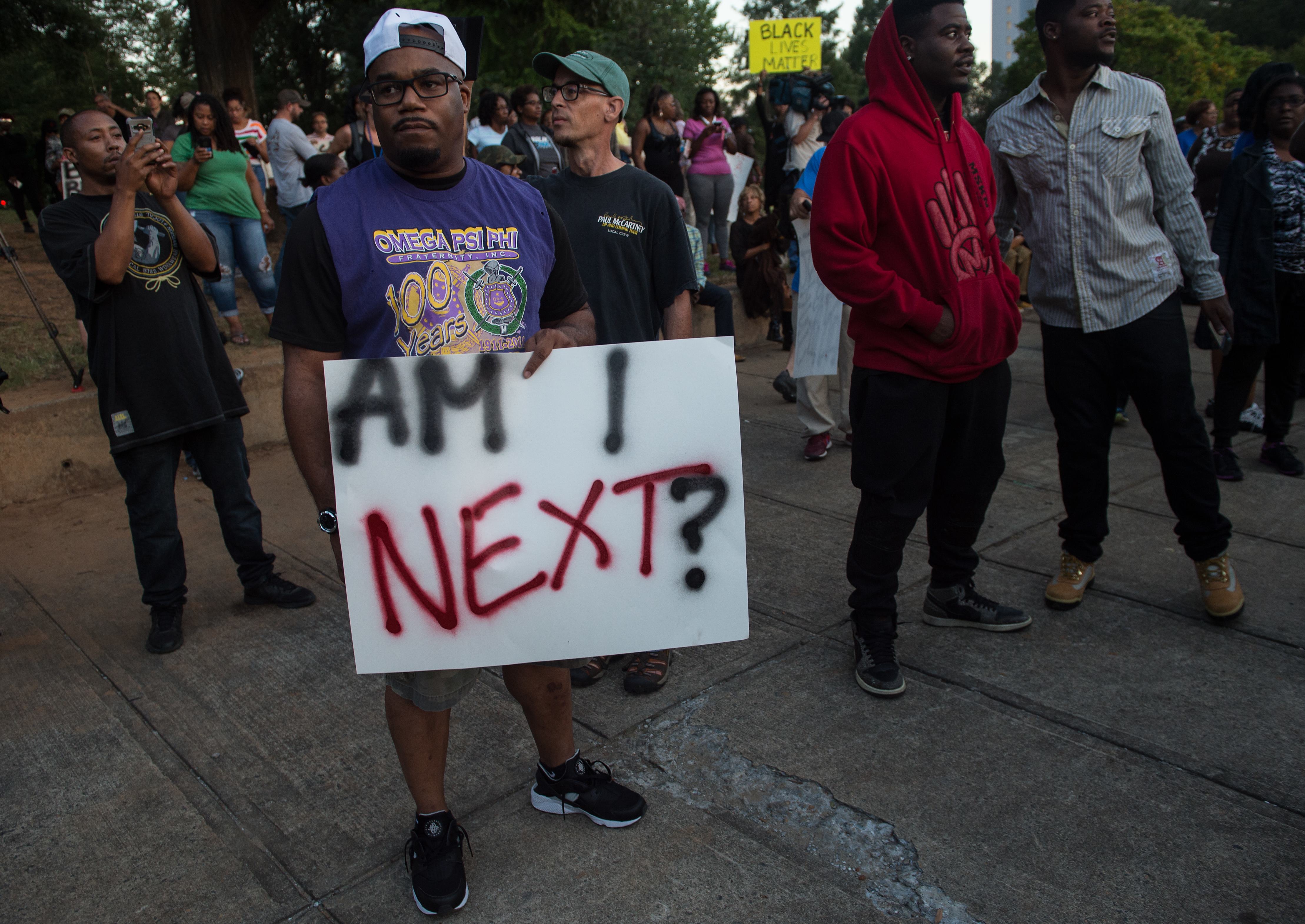 Protesters attend a demonstration against police brutality in Charlotte, North Carolina, on September 21, 2016, following the shooting of Keith Lamont Scott the previous day. (NICHOLAS KAMM/AFP/Getty Images)