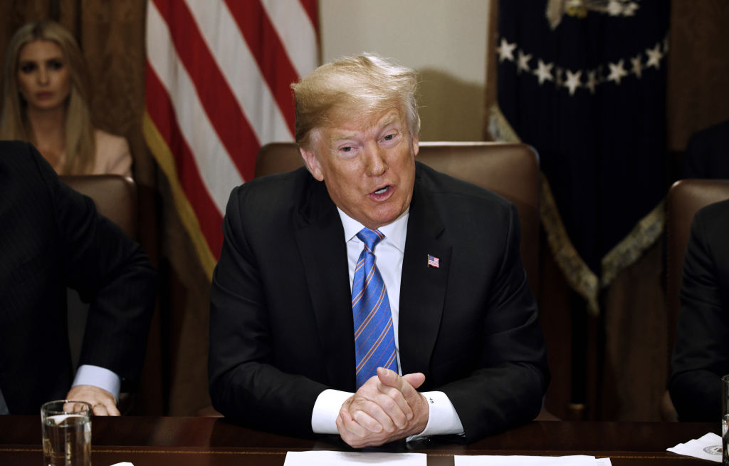 President Trump on Wednesday directly contradicted his own intelligence director, claiming Russia was no longer targeting the United States with cyberattacks. (PHOTO CREDIT: Olivier Douliery-Pool/Getty Images)