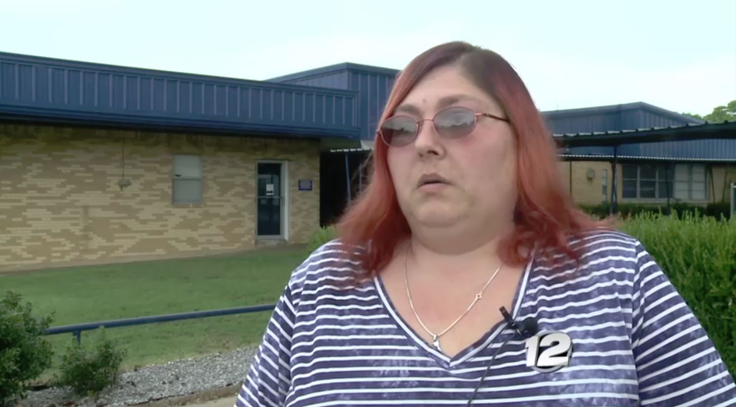 A group of parents planned a silently rally outside an Oklahoma school Tuesday morning on a behalf of a transgender 12-year-old who has been subjected to threats of violence. Above: Brandy Rose, the 12-year-old girl's mother. (PHOTO CREDIT: KXII News 12/Screenshot)