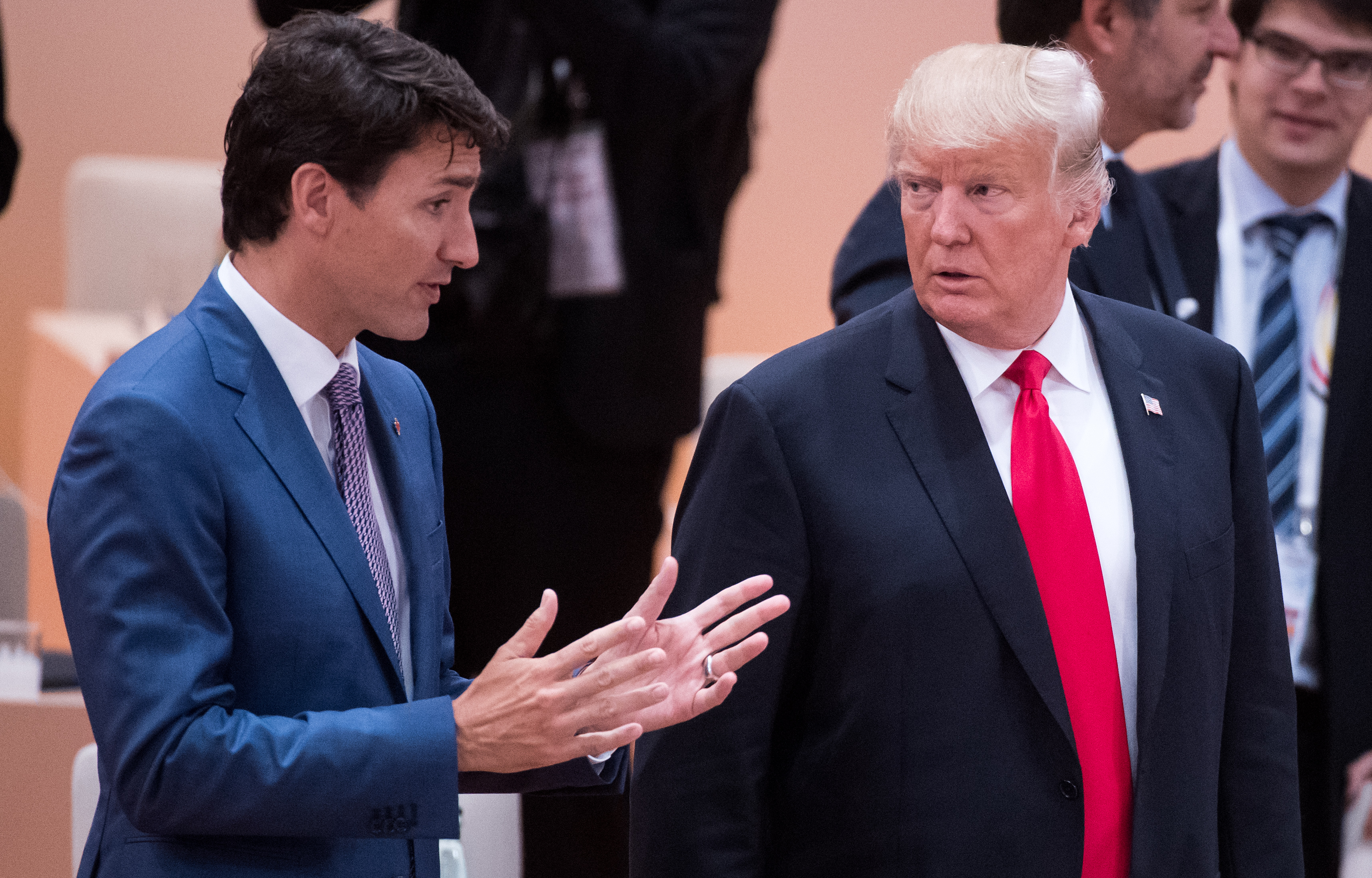 Canadian prime minister Justin Trudeau (L) in conversation with the American president Donald Trump at the G20 summit in Hamburg, Germany, 8 July 2017. (Photo Credit: Bernd von Jutrczenka/picture alliance via Getty Images)