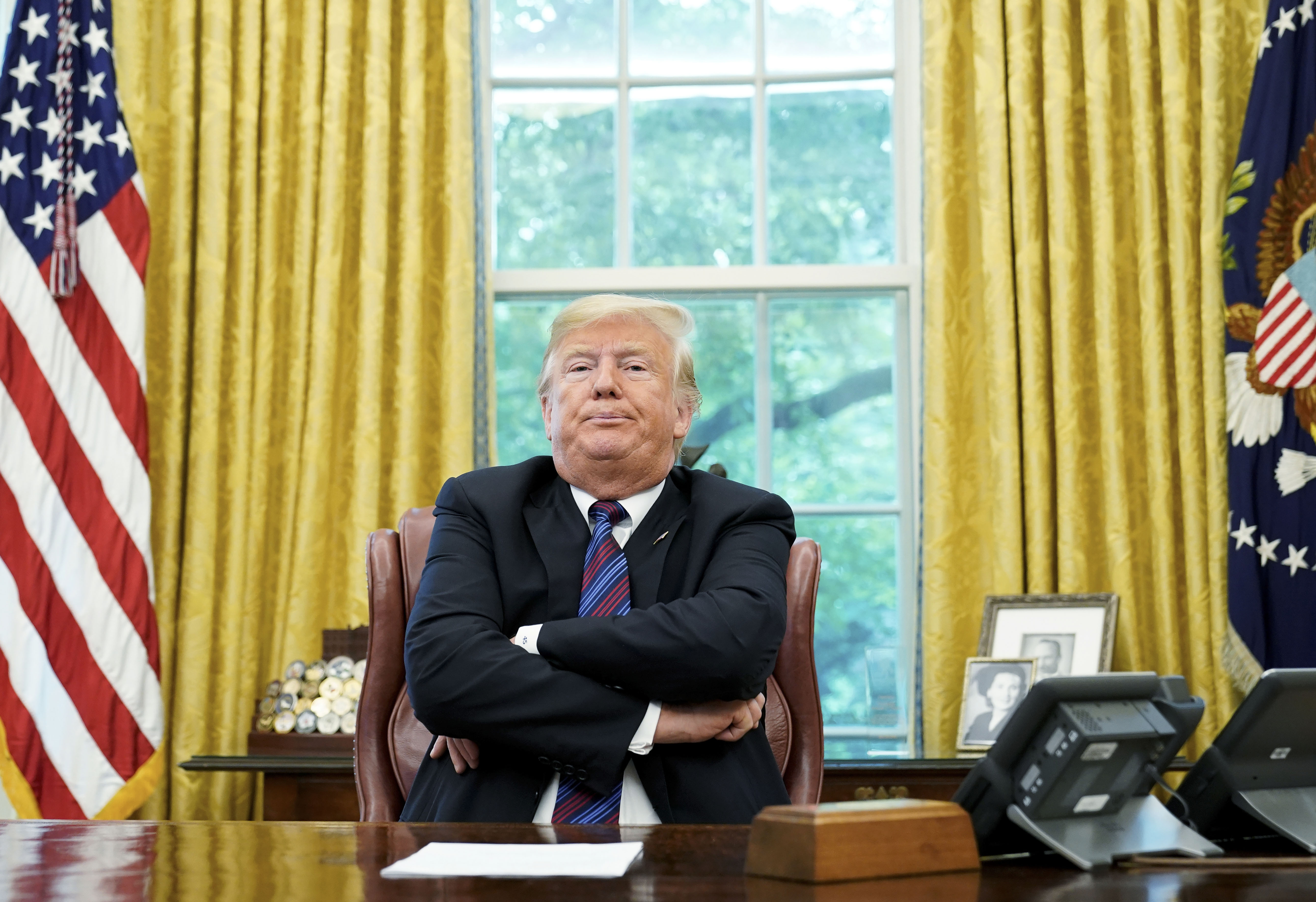 US President Donald Trump speaks to reporters after a phone conversation with Mexico's President Enrique Pena Nieto on trade in the Oval Office of the White House in Washington, DC on August 27, 2018. (PHOTO CREDIT: Mandel Ngan/AFP/Getty Images)