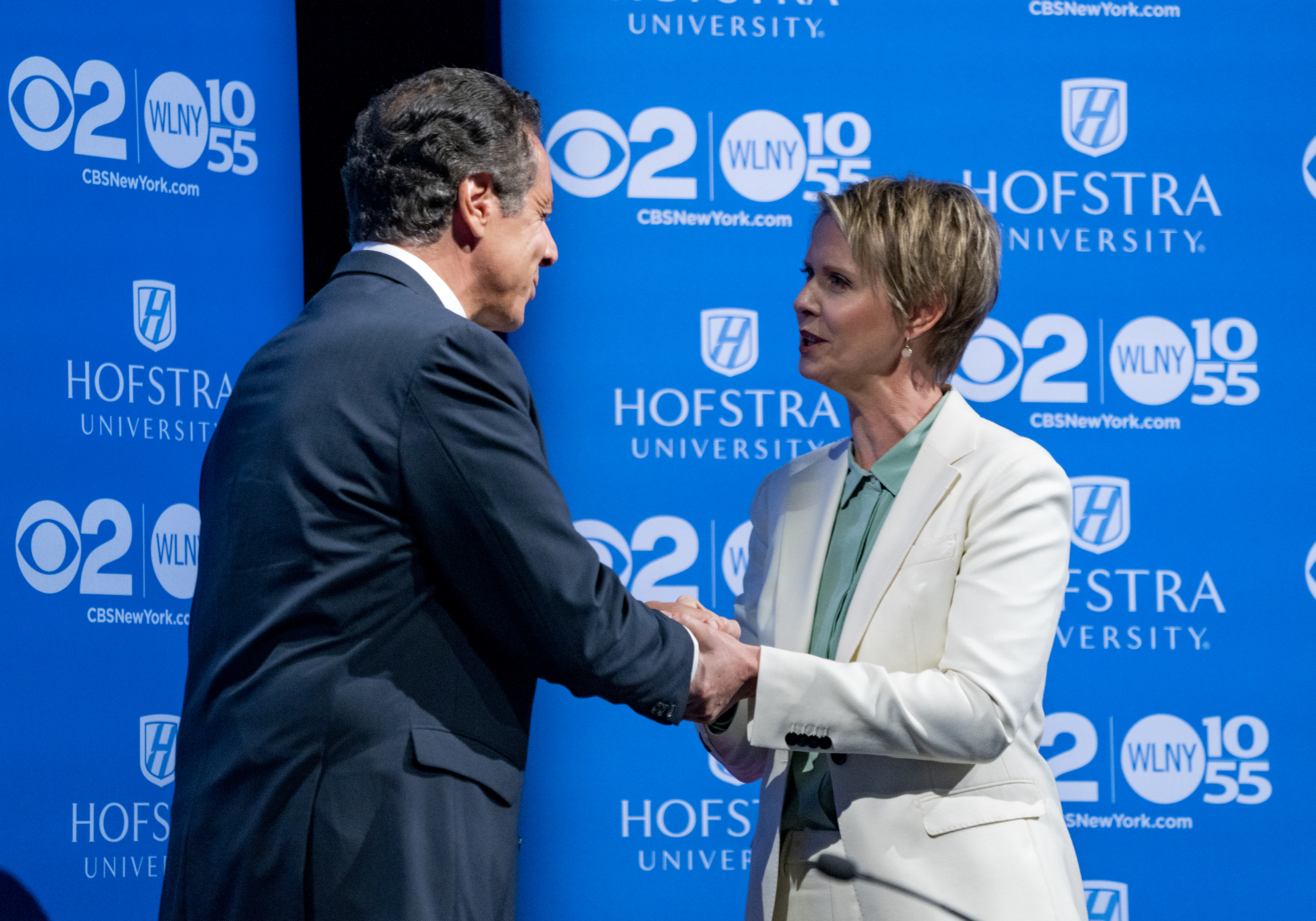 HEMPSTEAD, NY - AUGUST 29: New York Gov. Andrew Cuomo and primary opponent Cynthia Nixon shake hands before a debate at Hofstra University August 29, 2018 in Hempstead, New York. The debate is the only televised one between the two candidates before the primary on September 13. (Photo by Craig Ruttle-Pool/Getty Images)